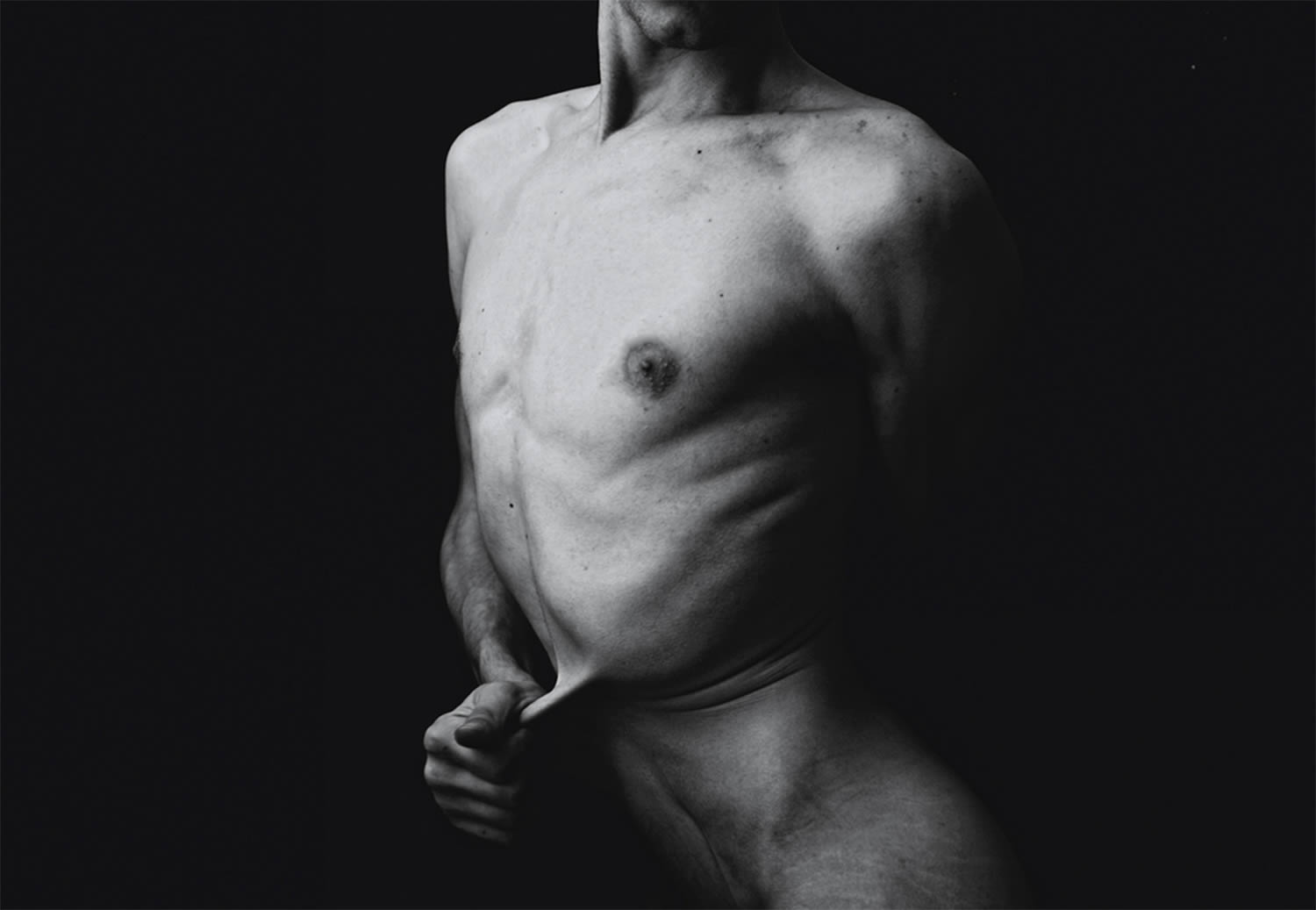 man pulling skin, photography