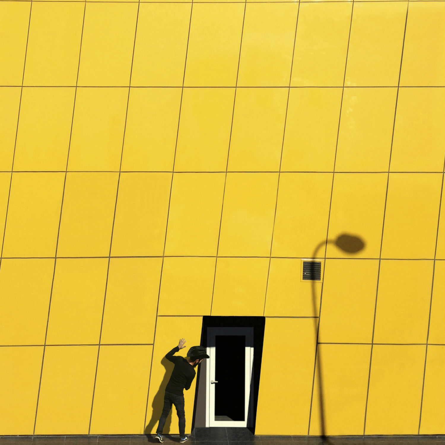 minimalist photography yener tour yellow building