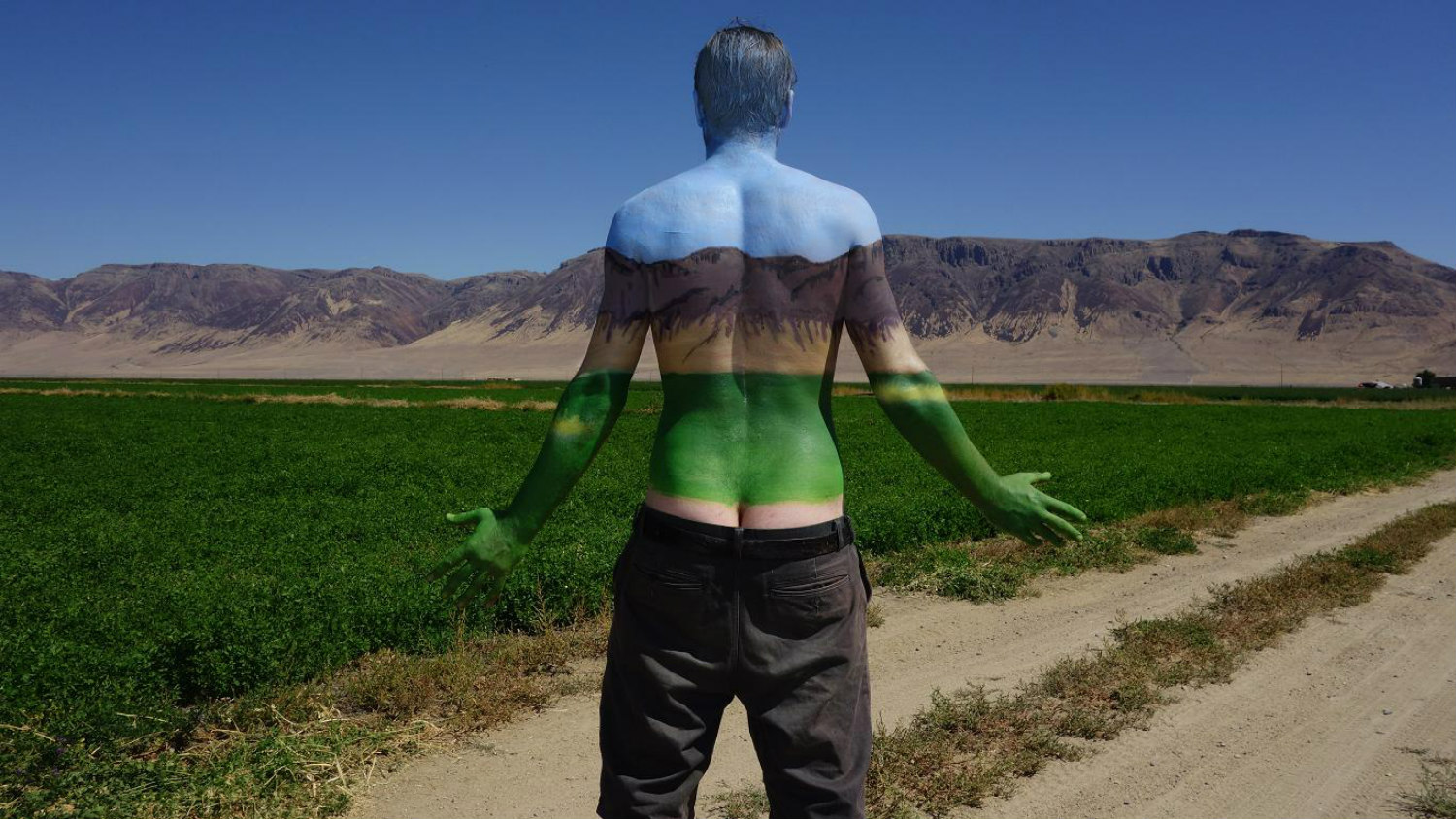 natalie fletcher body paint landscape portrait blue sky