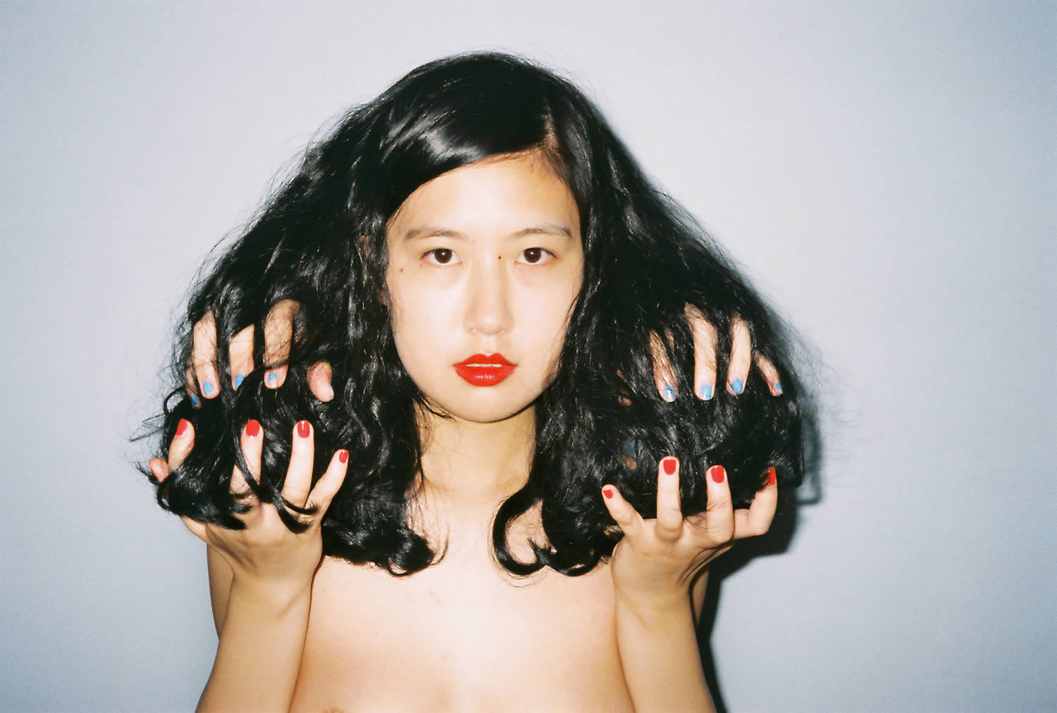 four hands in black hair, photography