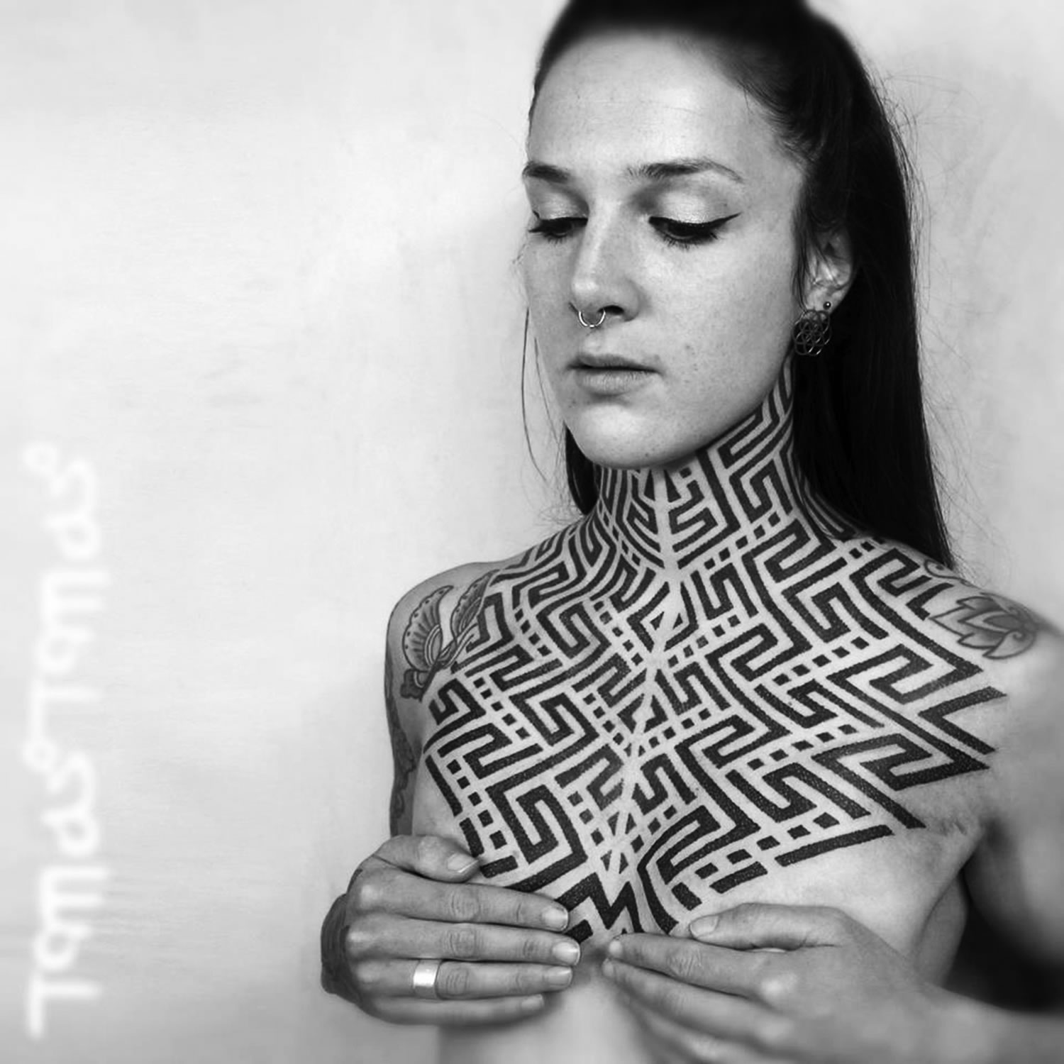 neck tattoo, geometric shapes/pattern, black