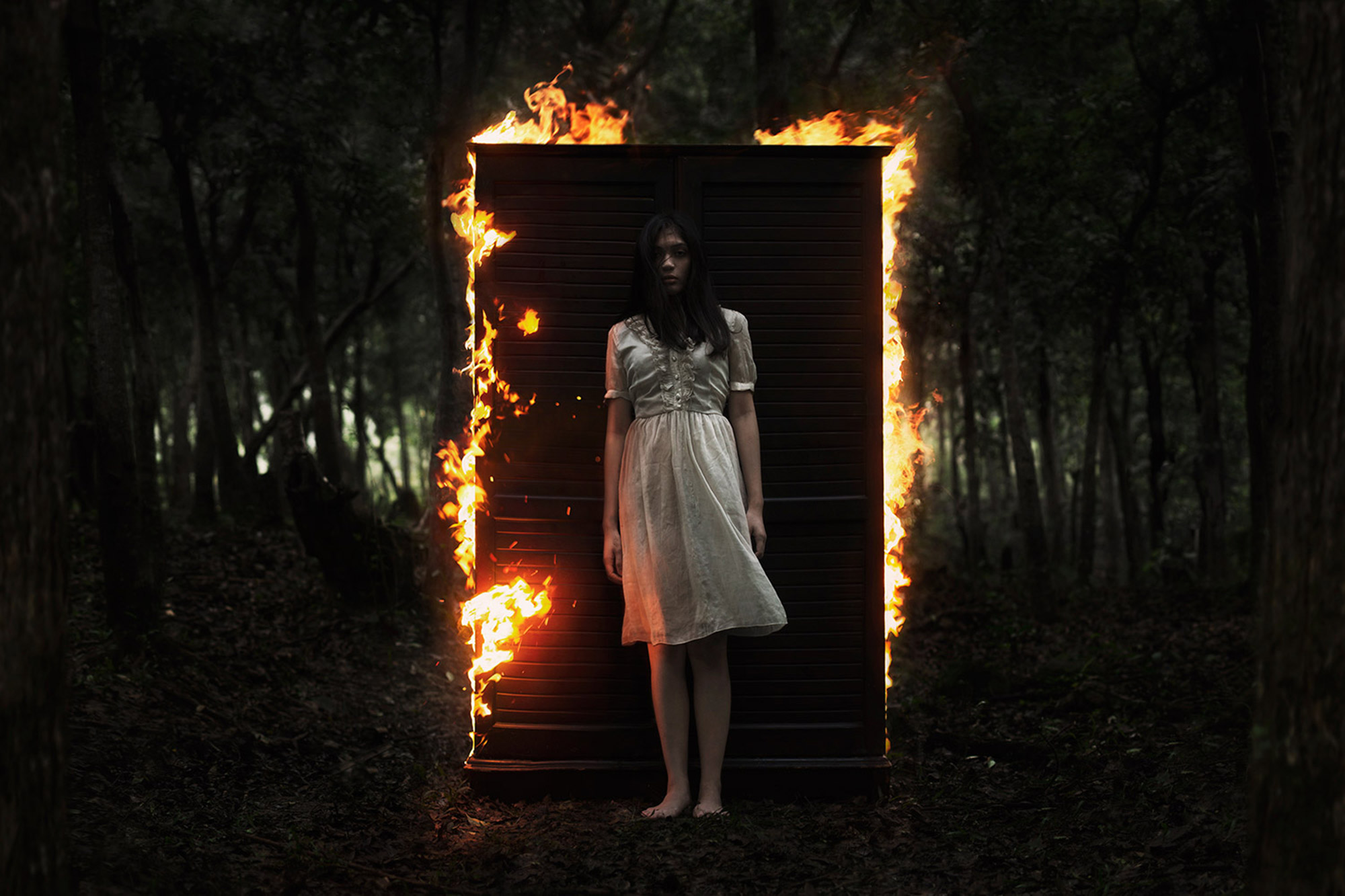 Mikael Aldo, fiery door, eerie woman