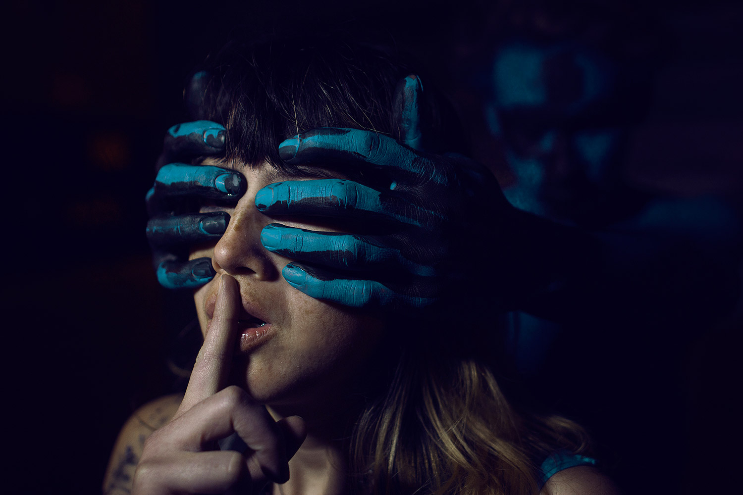 Kavan the Kid, model Lauren Kopp, dark photo with hands over a woman's eyes