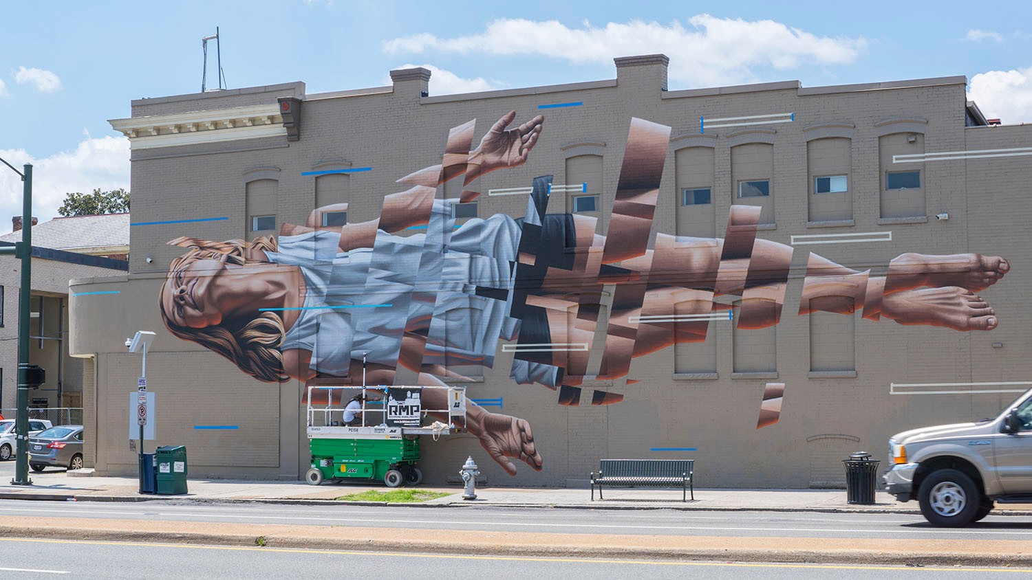 segmented street art of a woman in richmond by james bullough