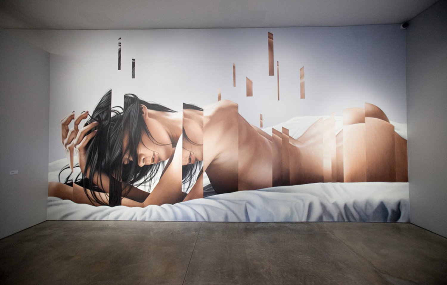 mural of a woman in segments by james bullough
