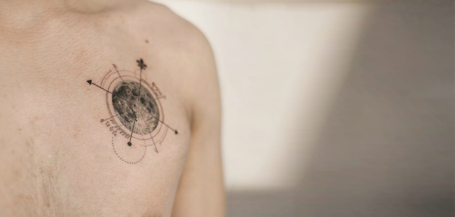 Compass moon tattoo by River Tattooist of Graffittoo.