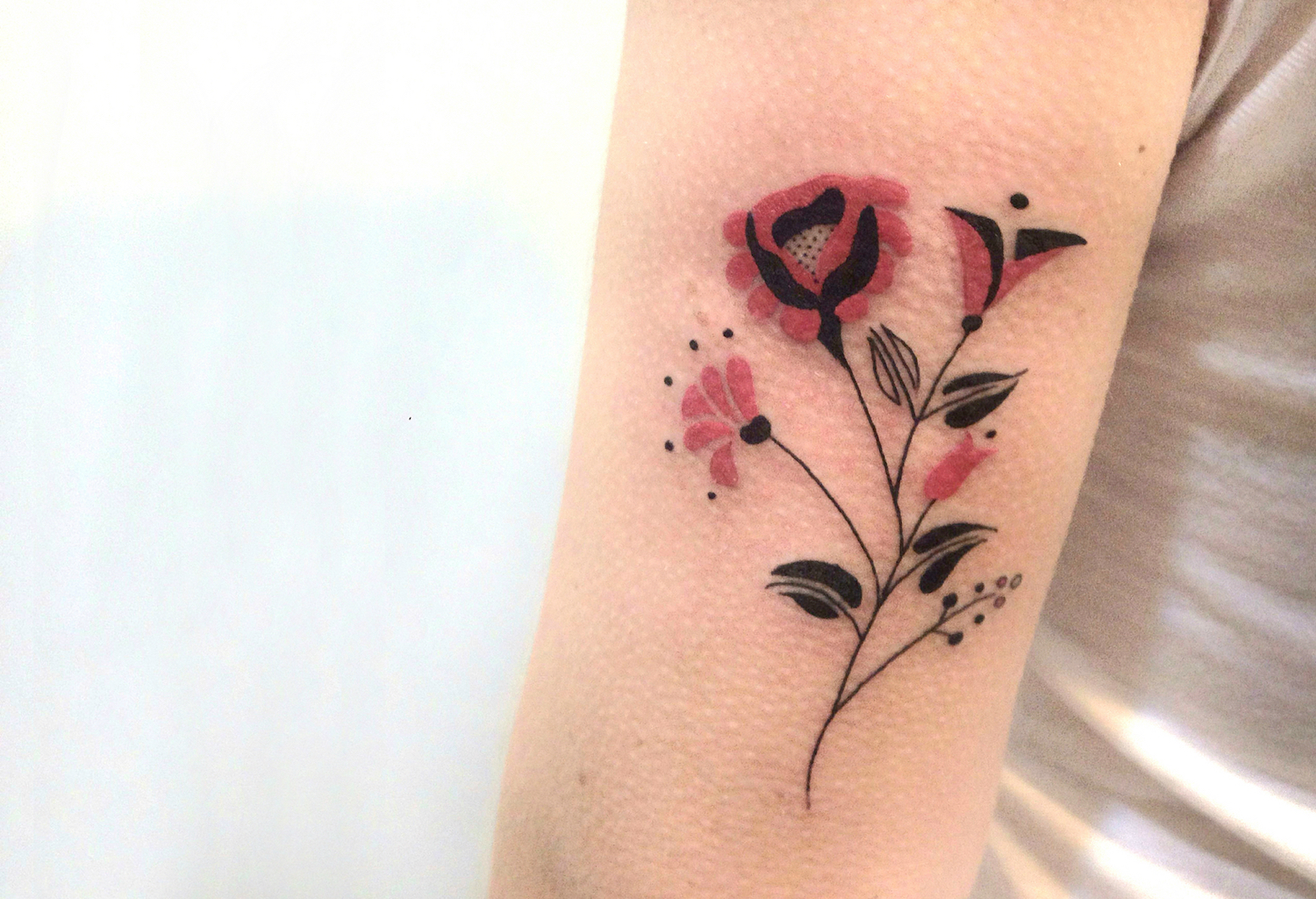 Russian flower tattoo by Brunella Simoes.