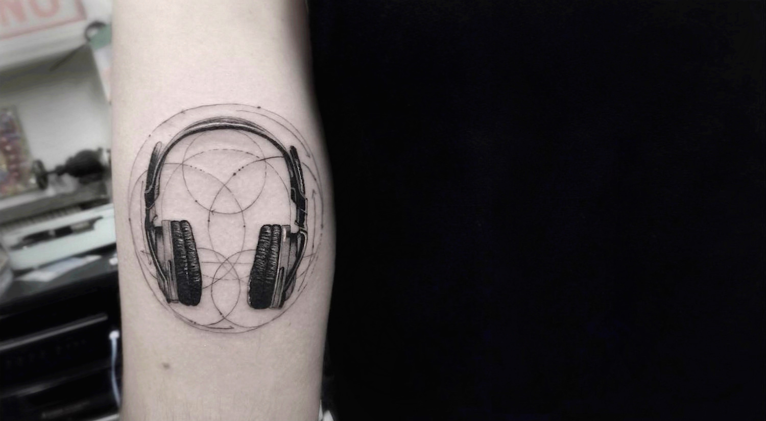 Headphones tattoo by Dr Woo.