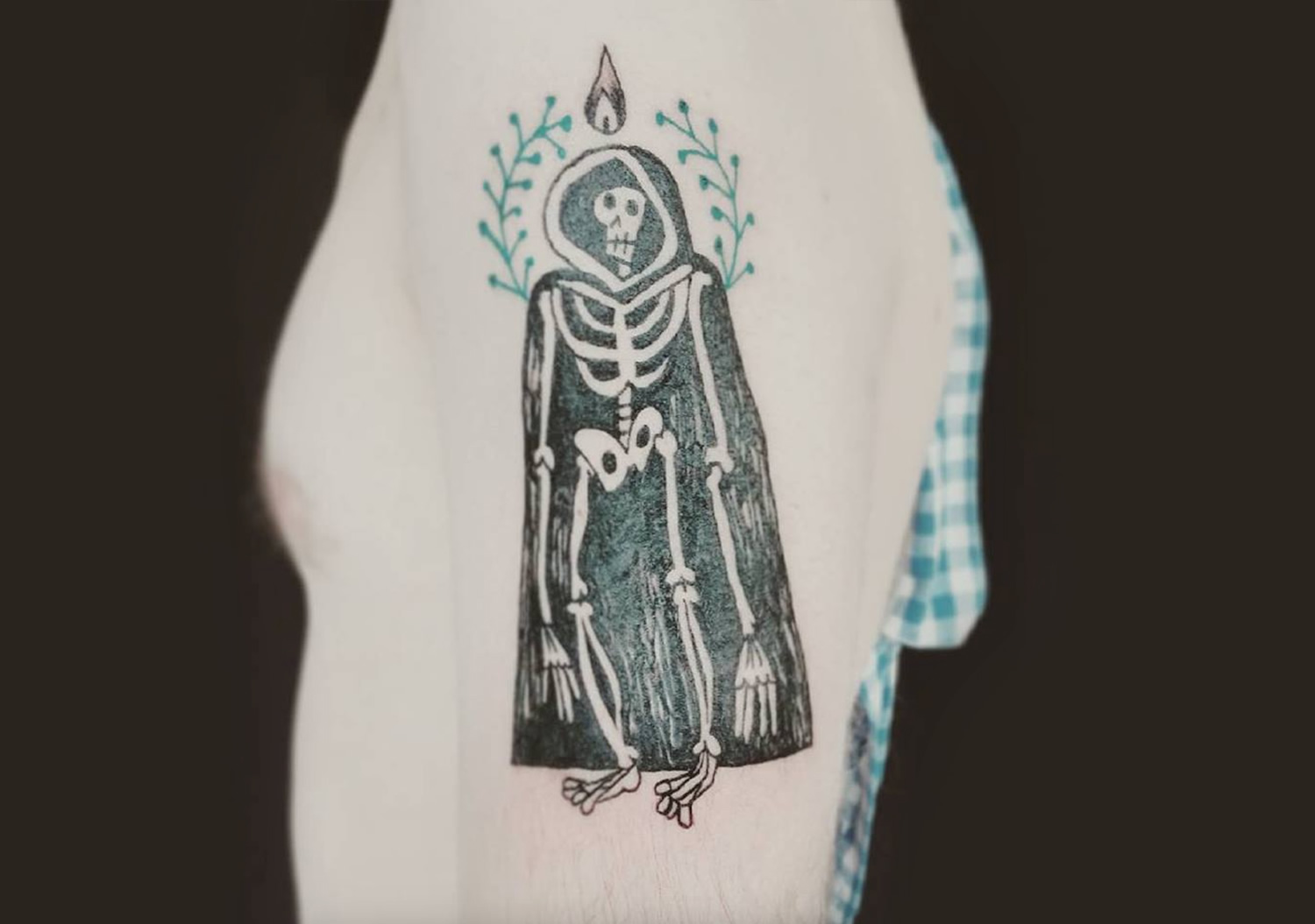 skeleton tattoo on bicep, sketch style tattoo