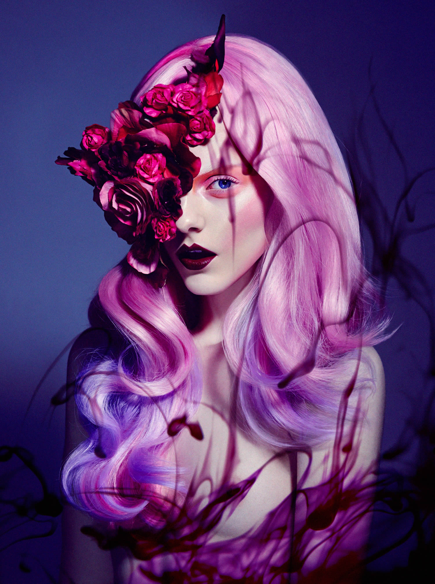 purple haired woman with flower