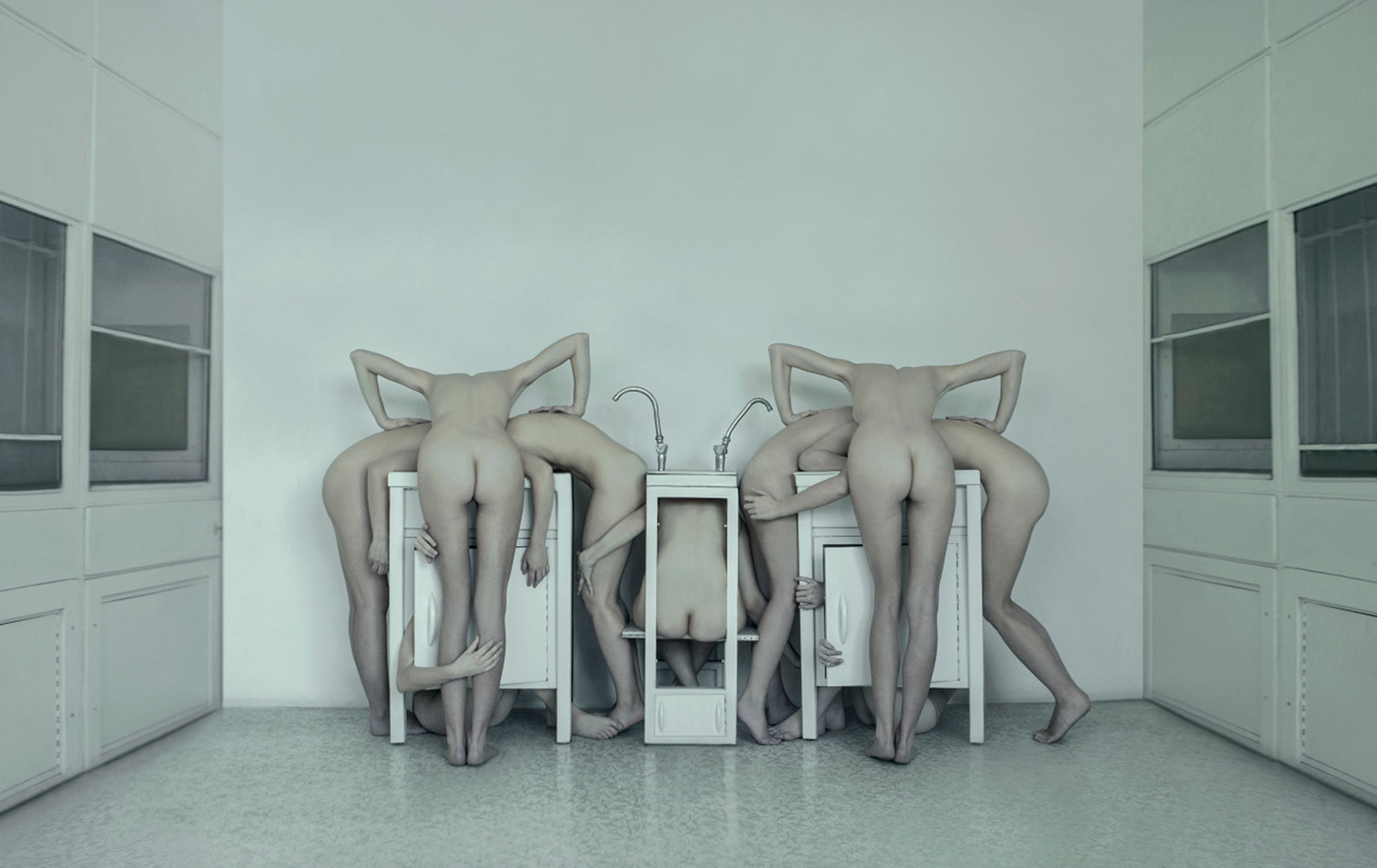Evelyn Bencicova, Ecce Homo, nude bodies in geometric forms around sinks