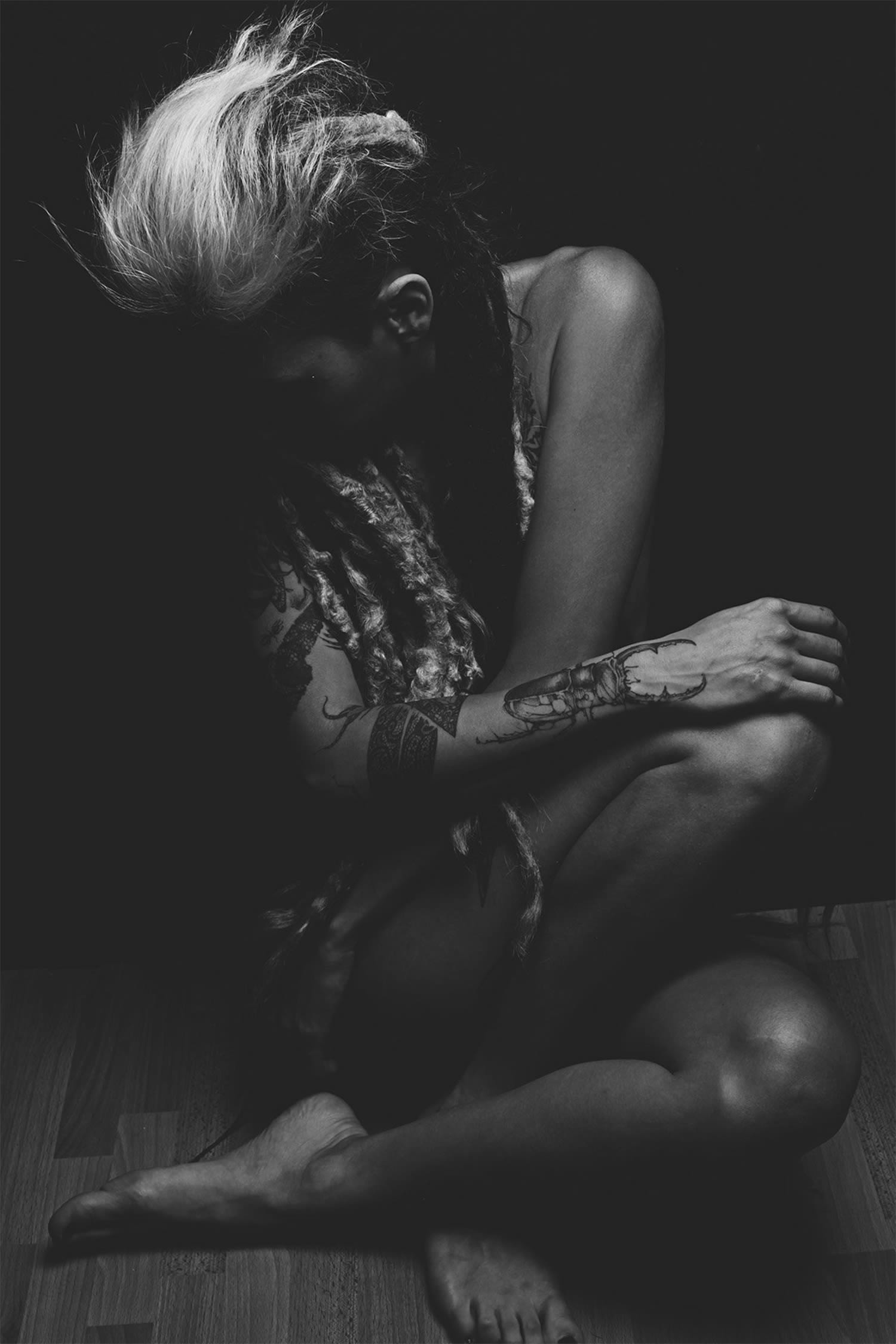 mohawk girl with tattooed body