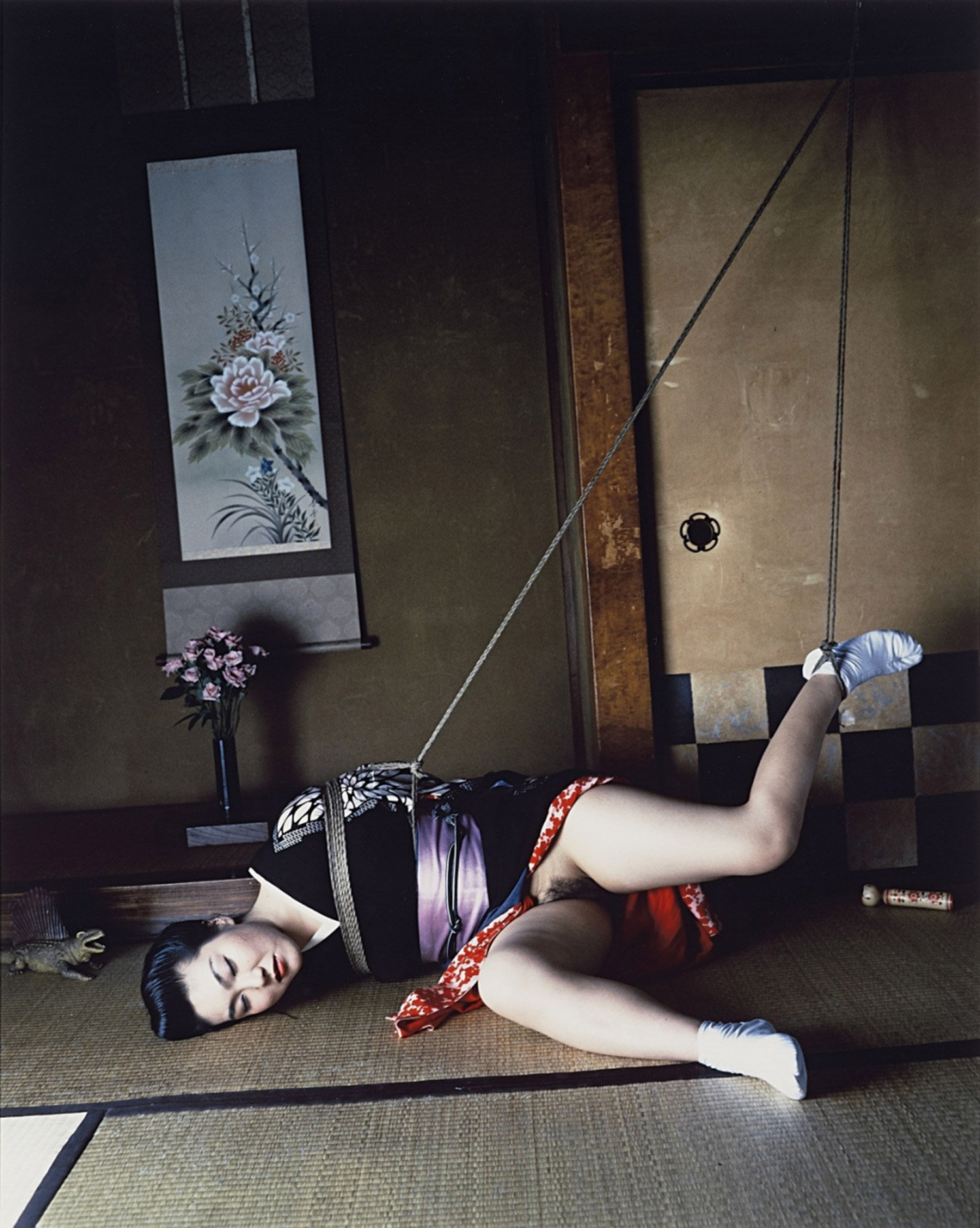 Nobuyoshi Araki, woman tied up on floor
