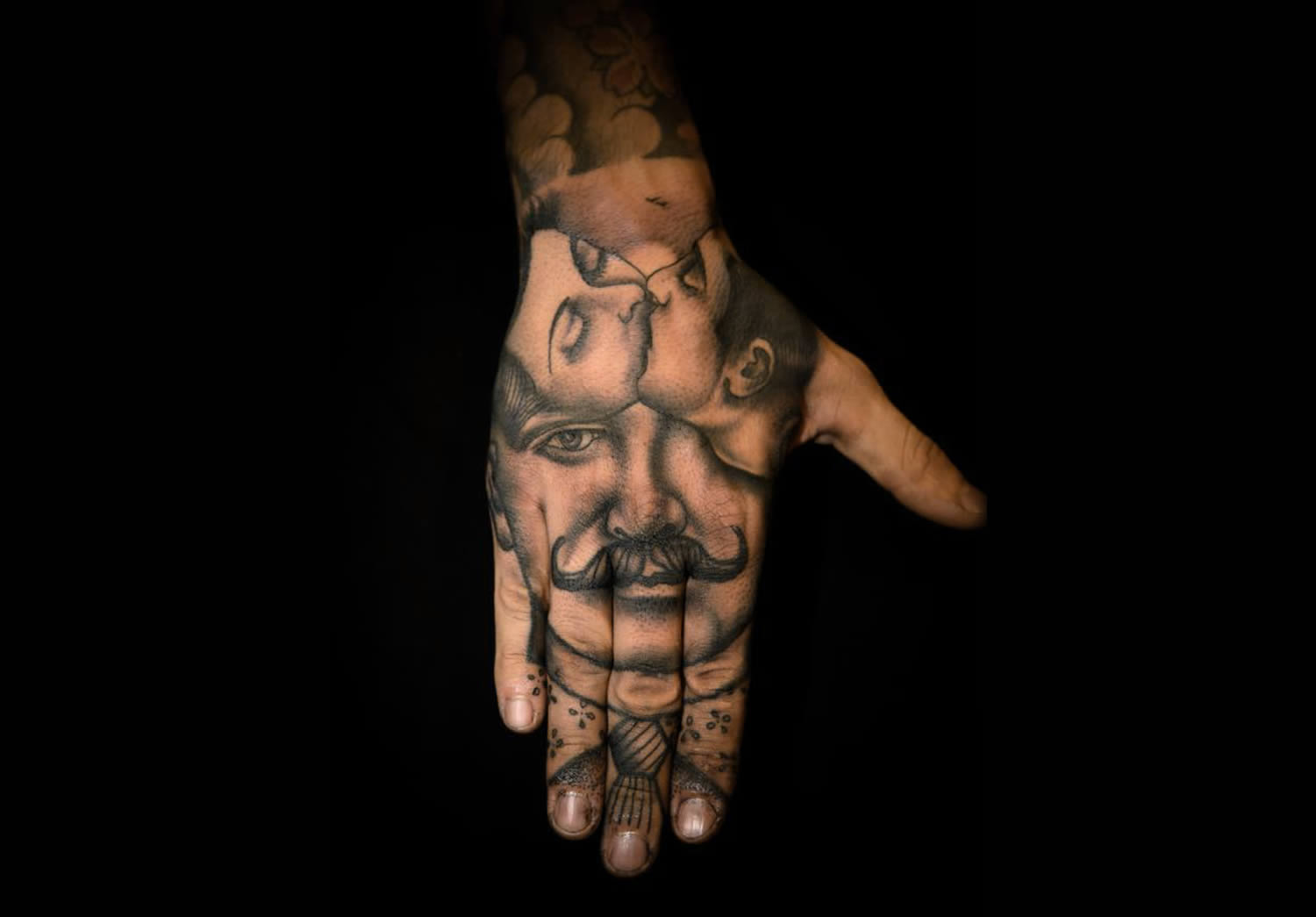 hand tattoo with moustache man and romantic couple