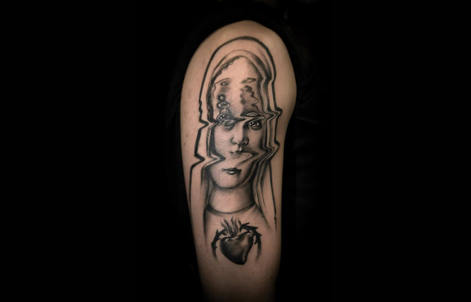 religious figure tattoo