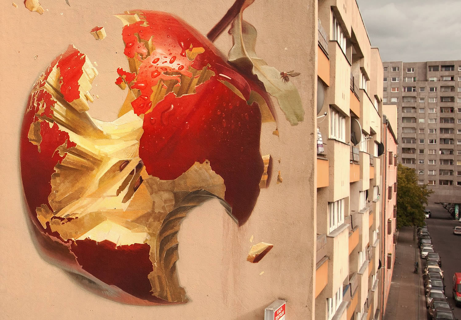 world apple on building, graffiti