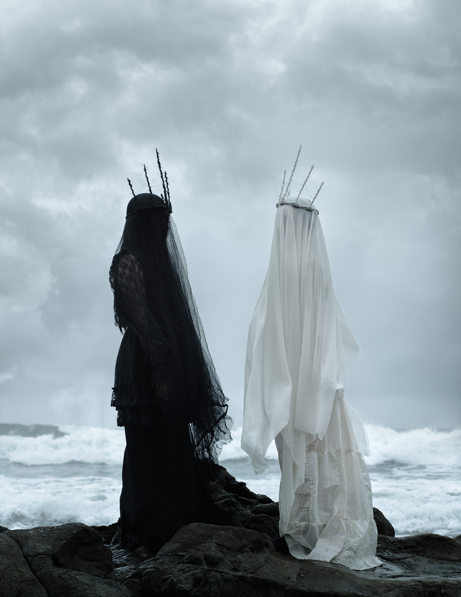 American Ghoul, Siren, two spectral figures standing on the shore