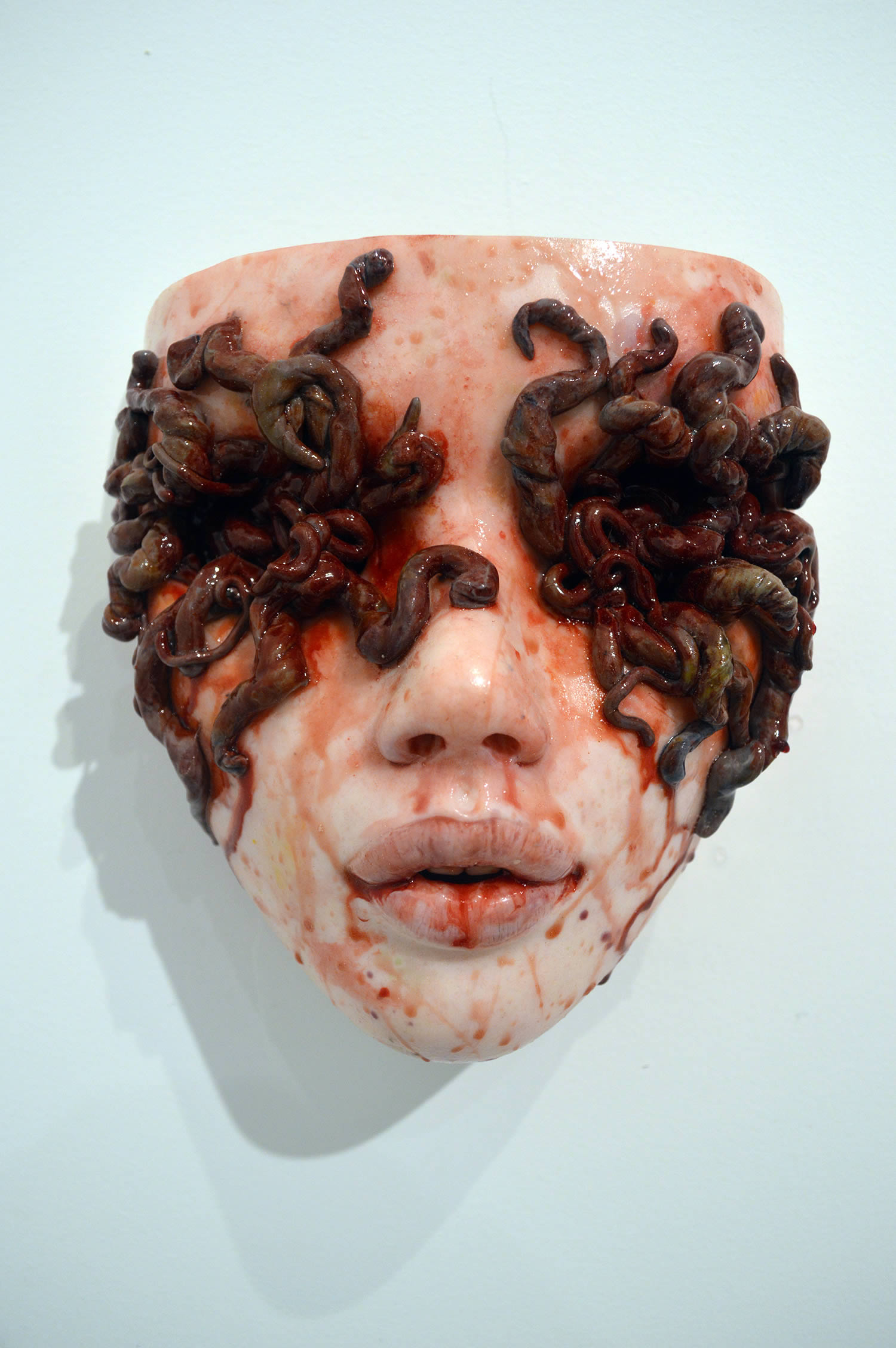 Colin Christian, Squirm - doll face with worms bursting out eyes