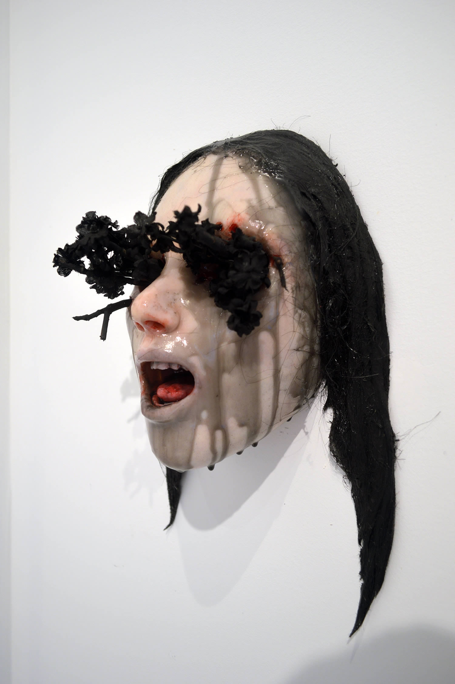Colin Christian, Stricken - sculpted face with black branches coming out eye sockets
