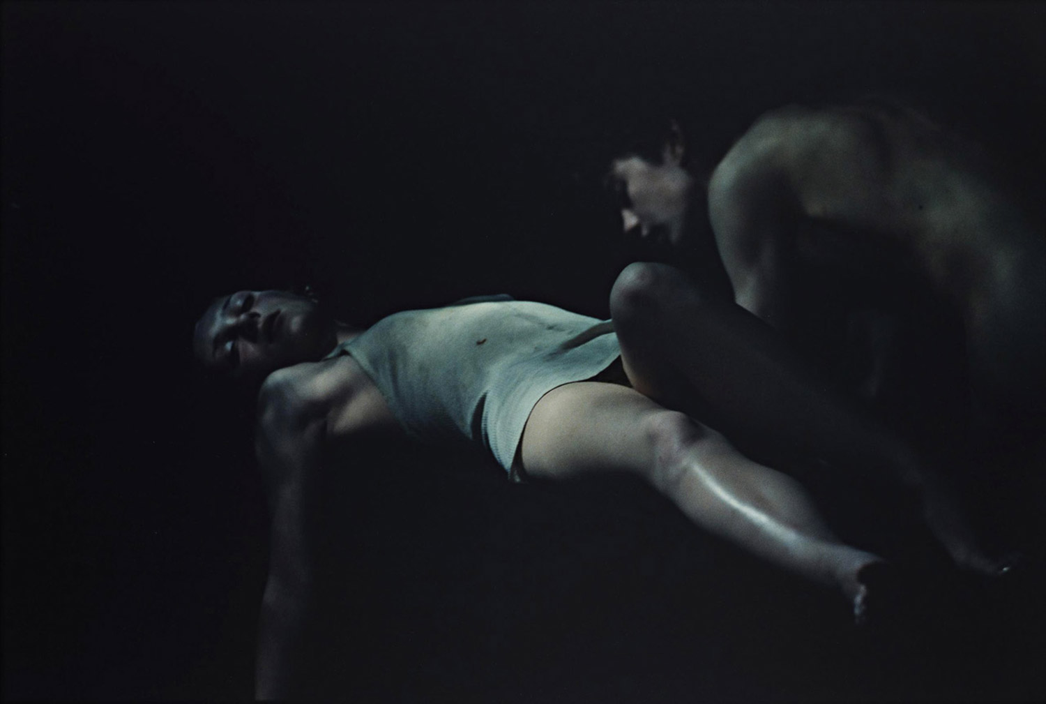Bill Henson - intimate scene with a young couple in the darkness
