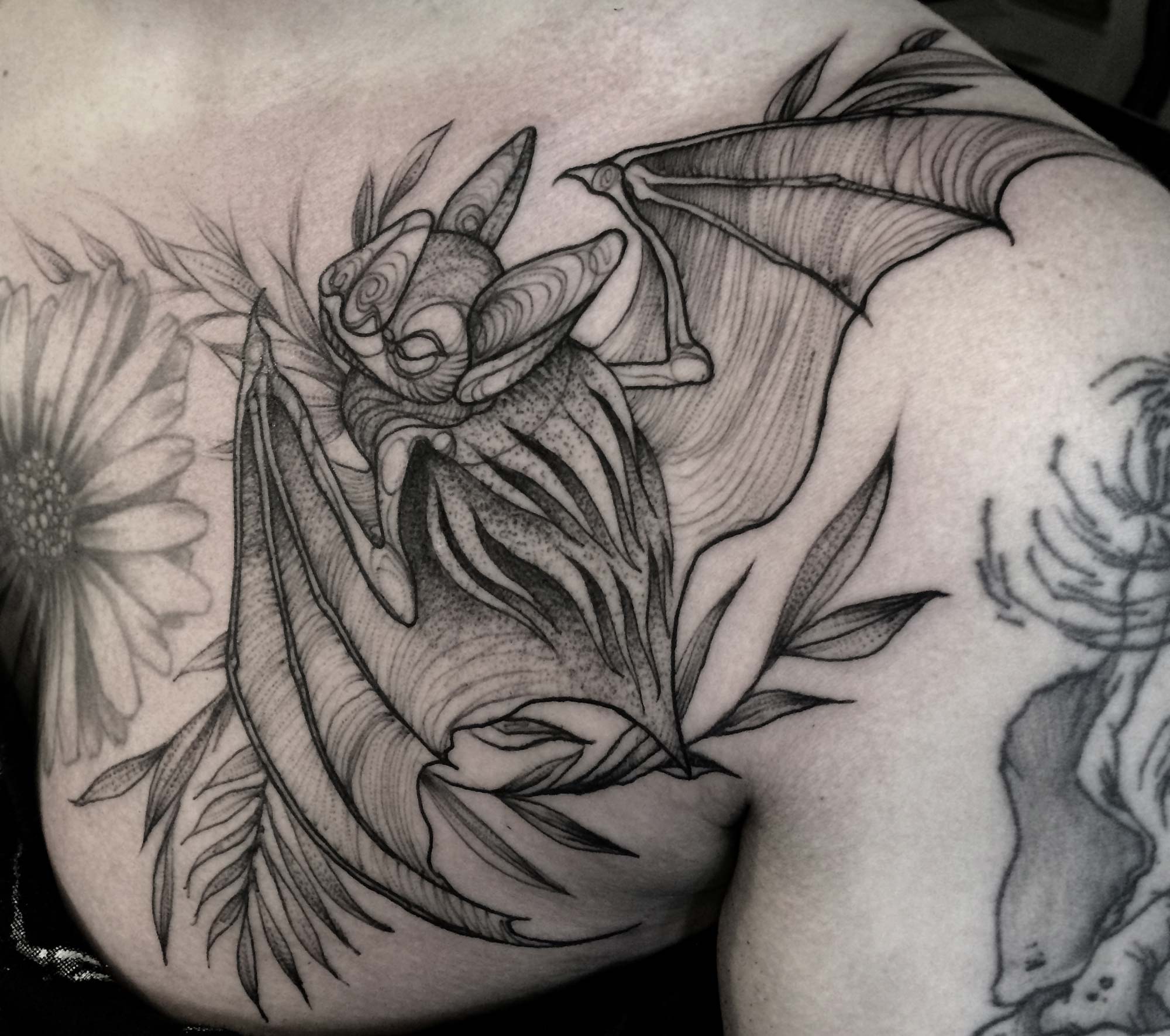 Nomi Chi bat tattoo