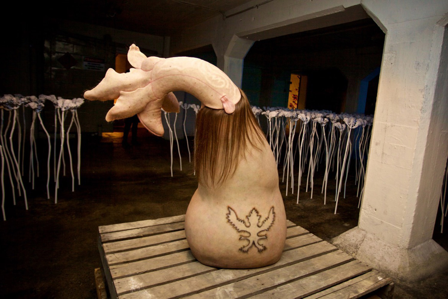 Patricia Piccinni, Bootflower, back view — fleshy flower installation