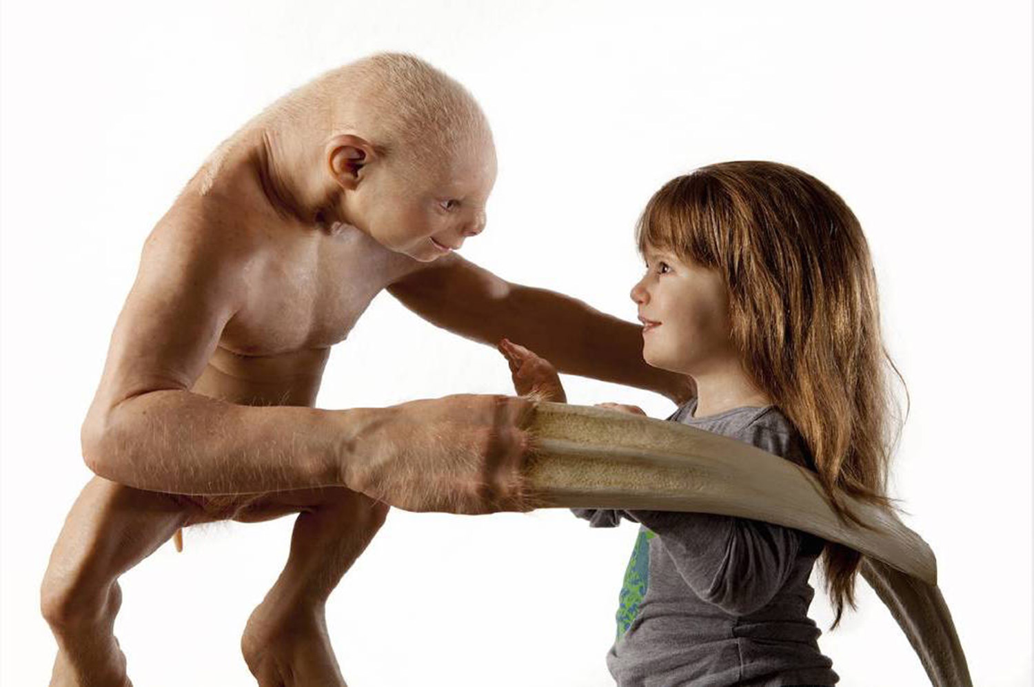 Patricia Piccinini, The Welcome Guest, long-clawed mutant with young girl