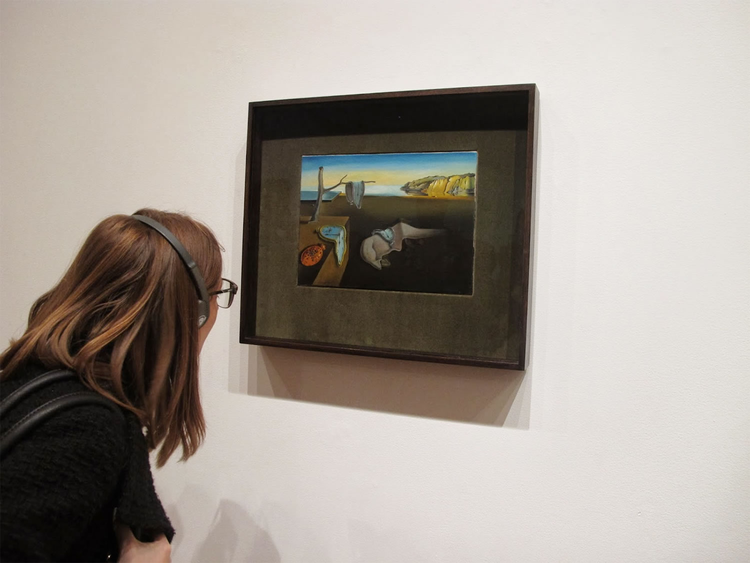 Picture of The Persistence of Memory hanging on museum wall. Photo © Christina Whiting