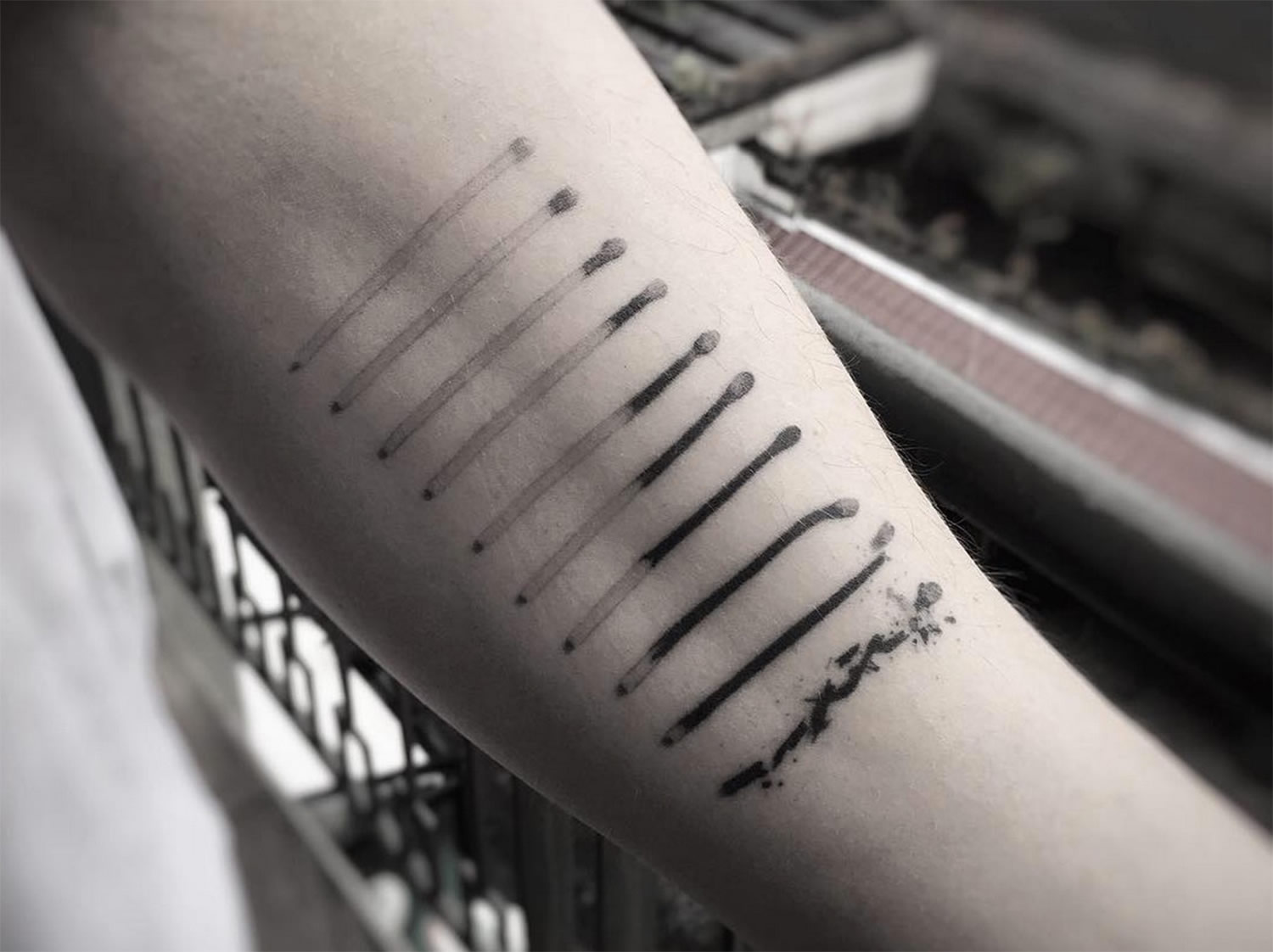 burnt matchsticks (tattoo) by Balazs Bercsenyi