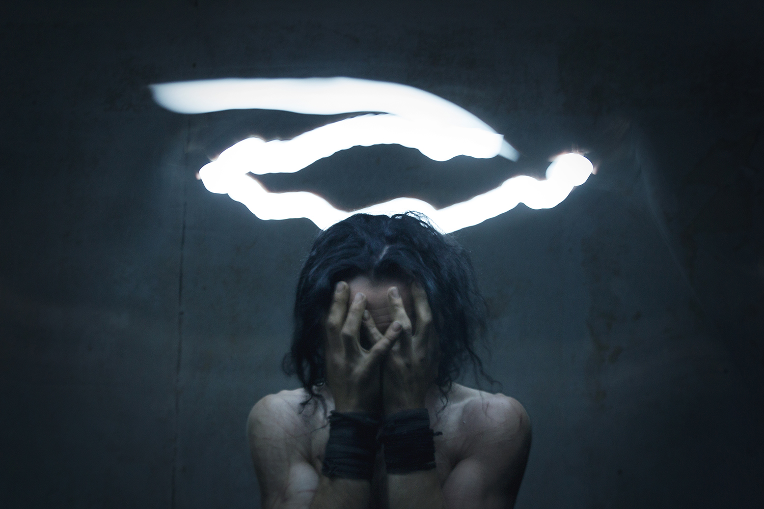 Elena Helfrecht, the Masculine, the fallen - man in eerie light