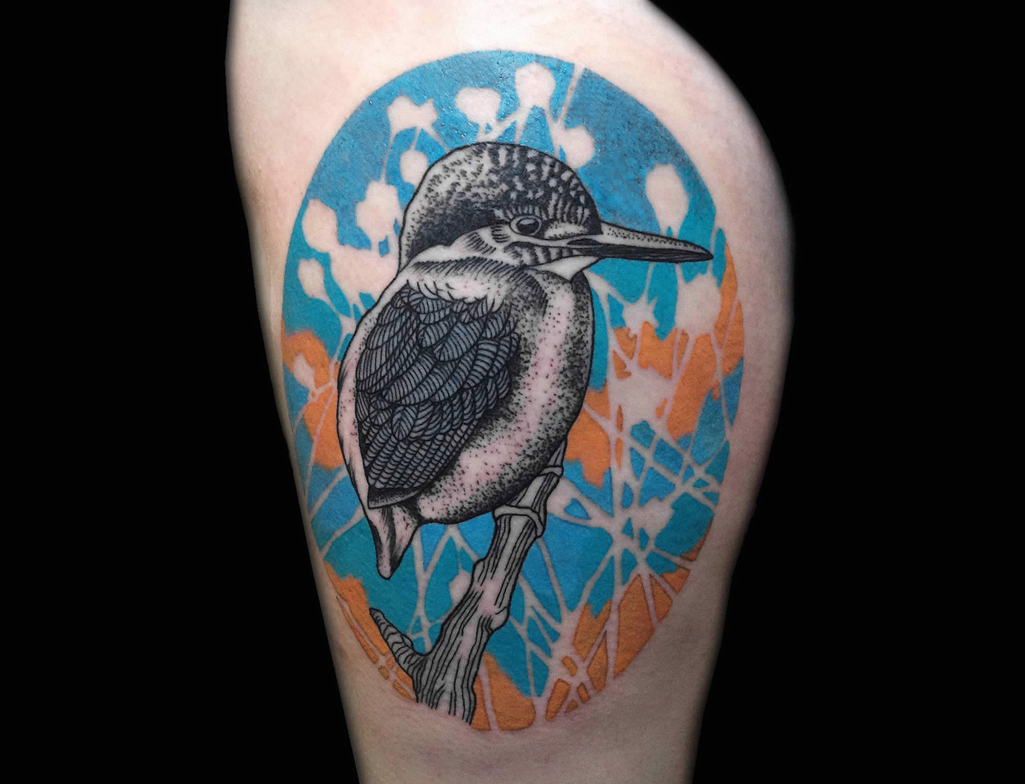 bird tattoo on thigh