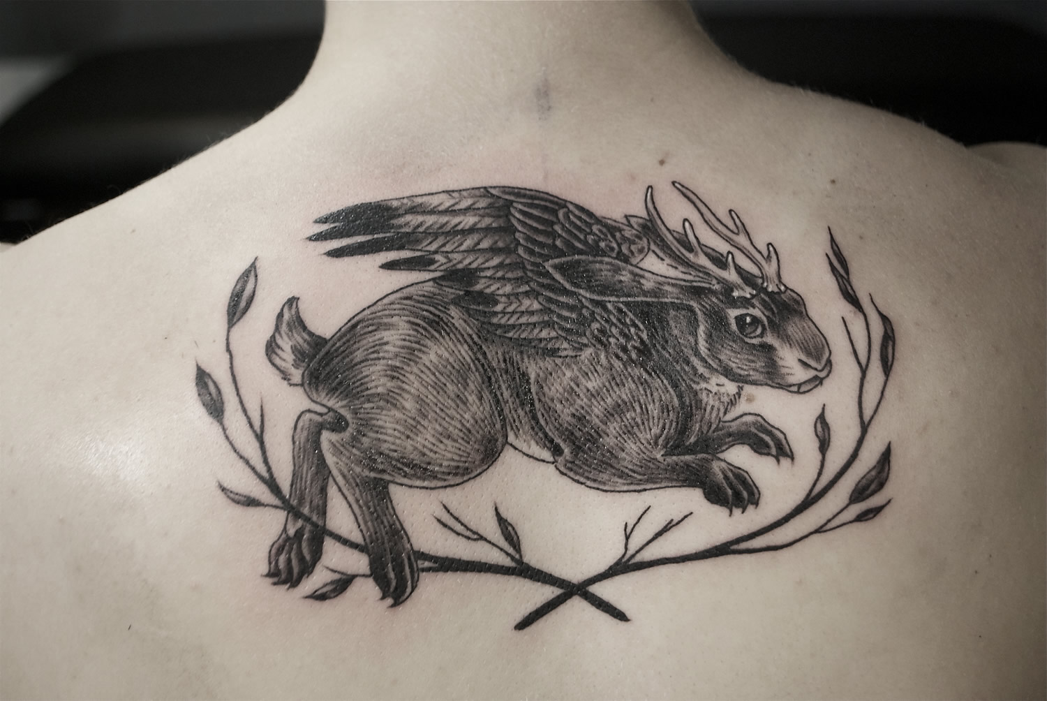 rabbit with wing tattoo by Alison Woodward