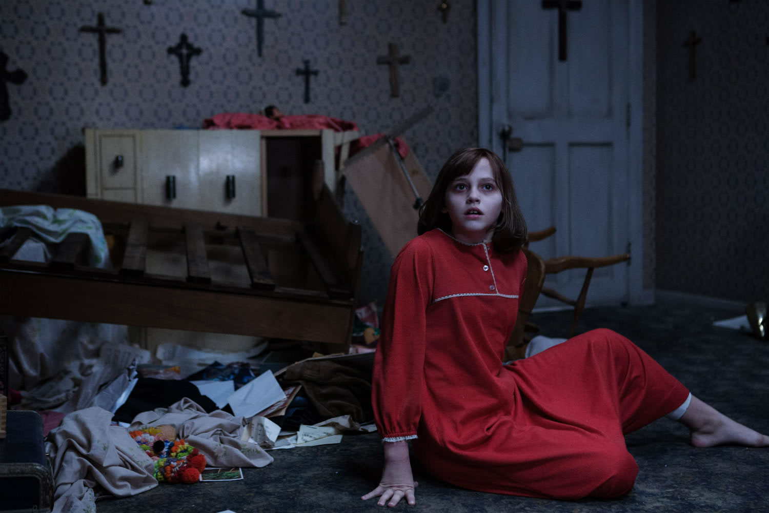 girl in red pijamas in the conjuring 2 movie