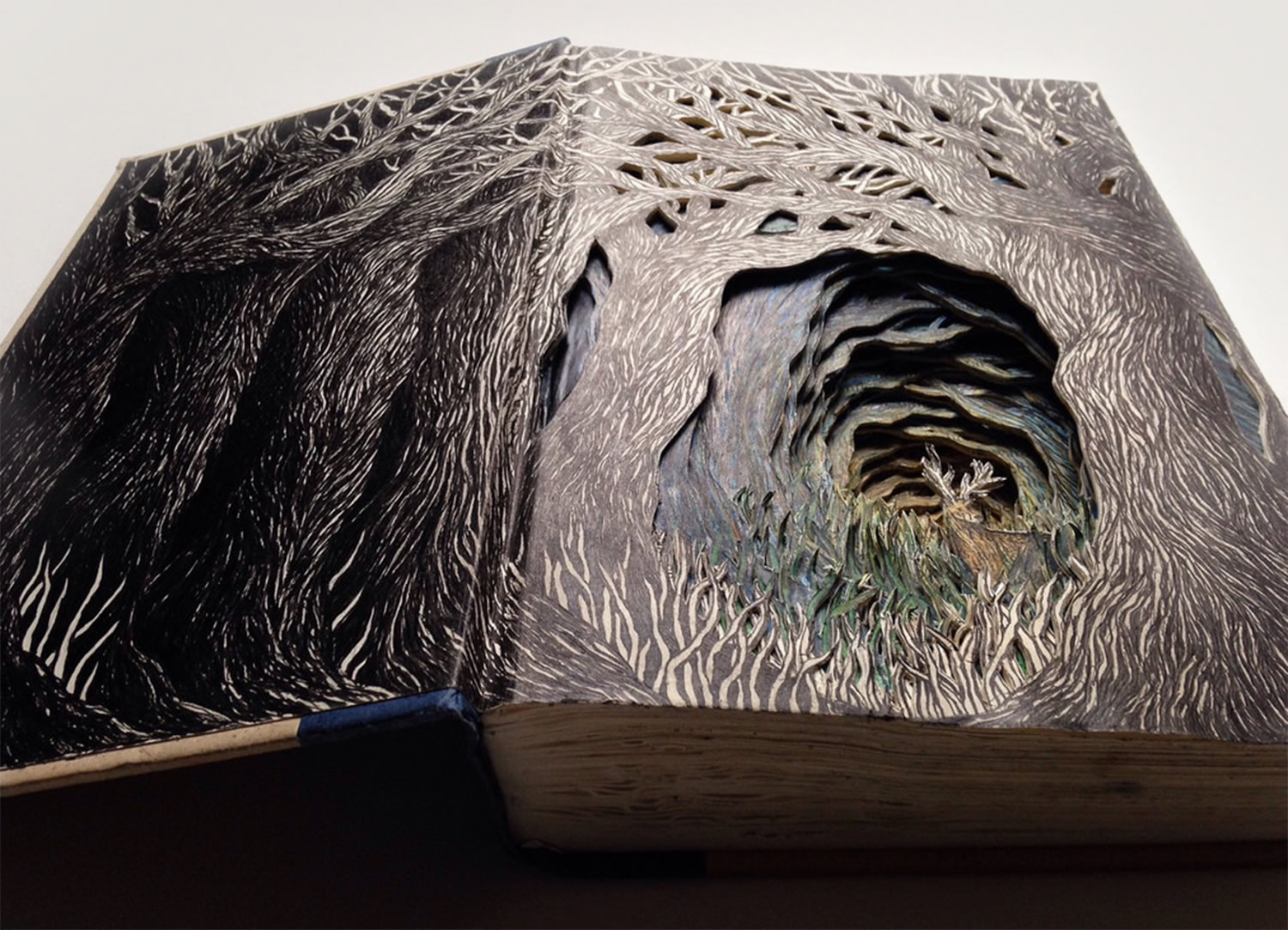 altered book, paper art by Isobelle Ouzman