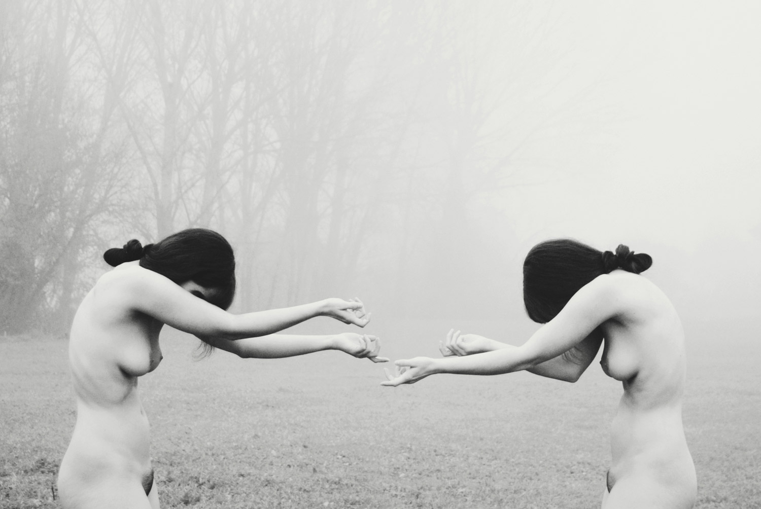 Dara Scully - two women reaching for each other