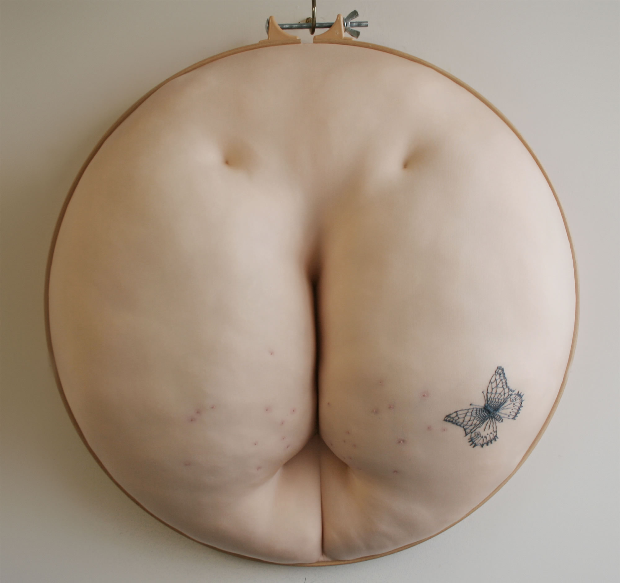 buttocks with pimples, Embroidery sculpture by Sally Hewett