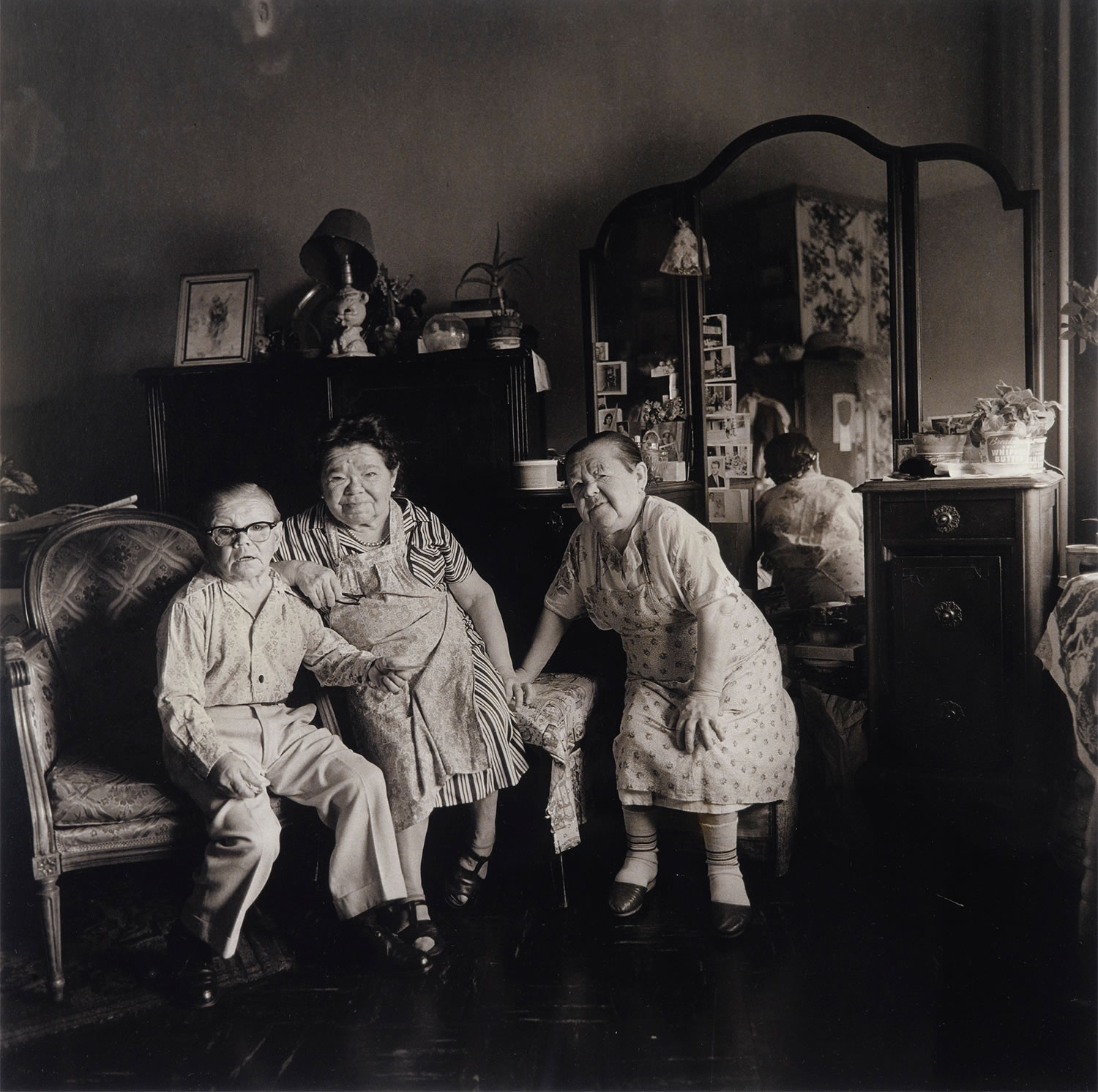 Russian midget friends in a living room on 100th street, NYC, 1963.