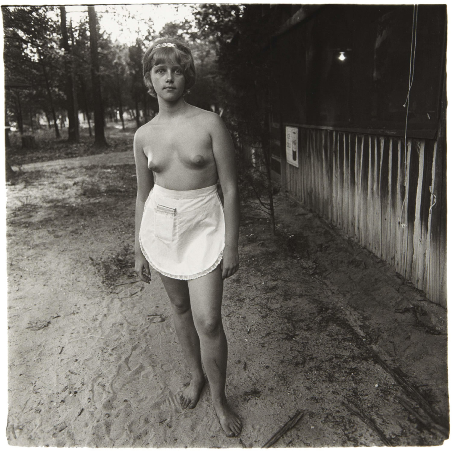 A young waitress at a nudist camp, N.J., 1963