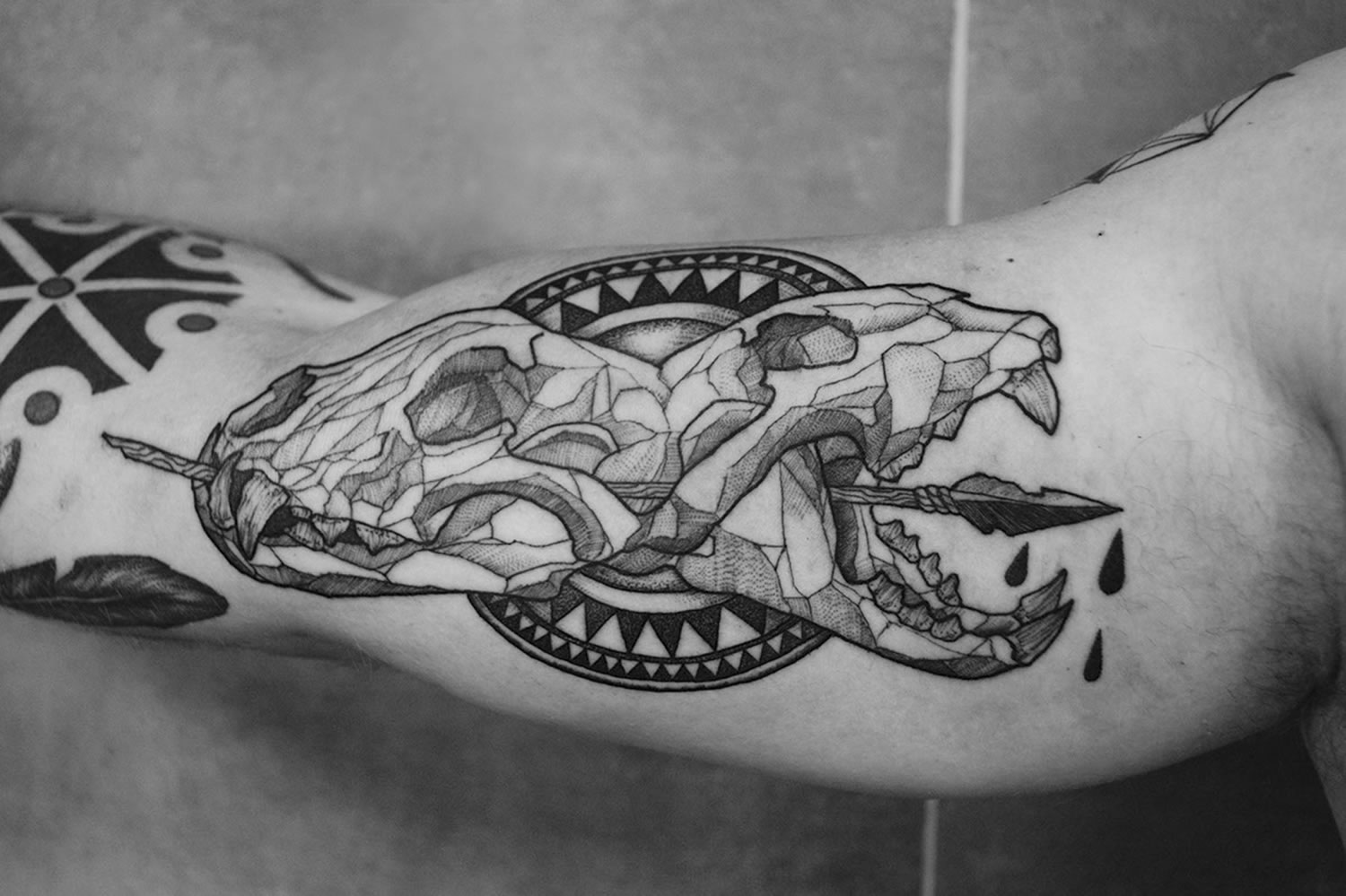 skull tattoo with geometric background
