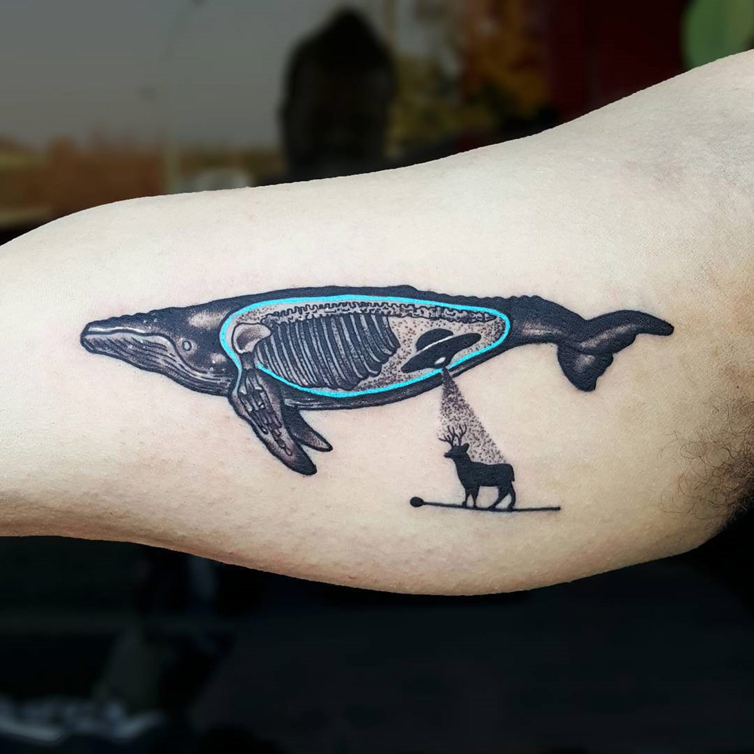 spaceship inside of whale abducting a cow on arm by matteo nangeroni