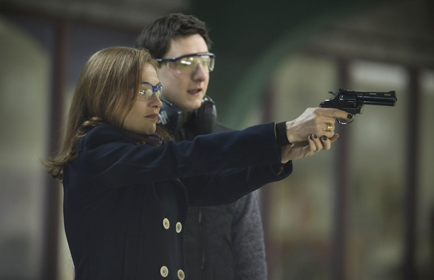 woman holding gun, Elle movie