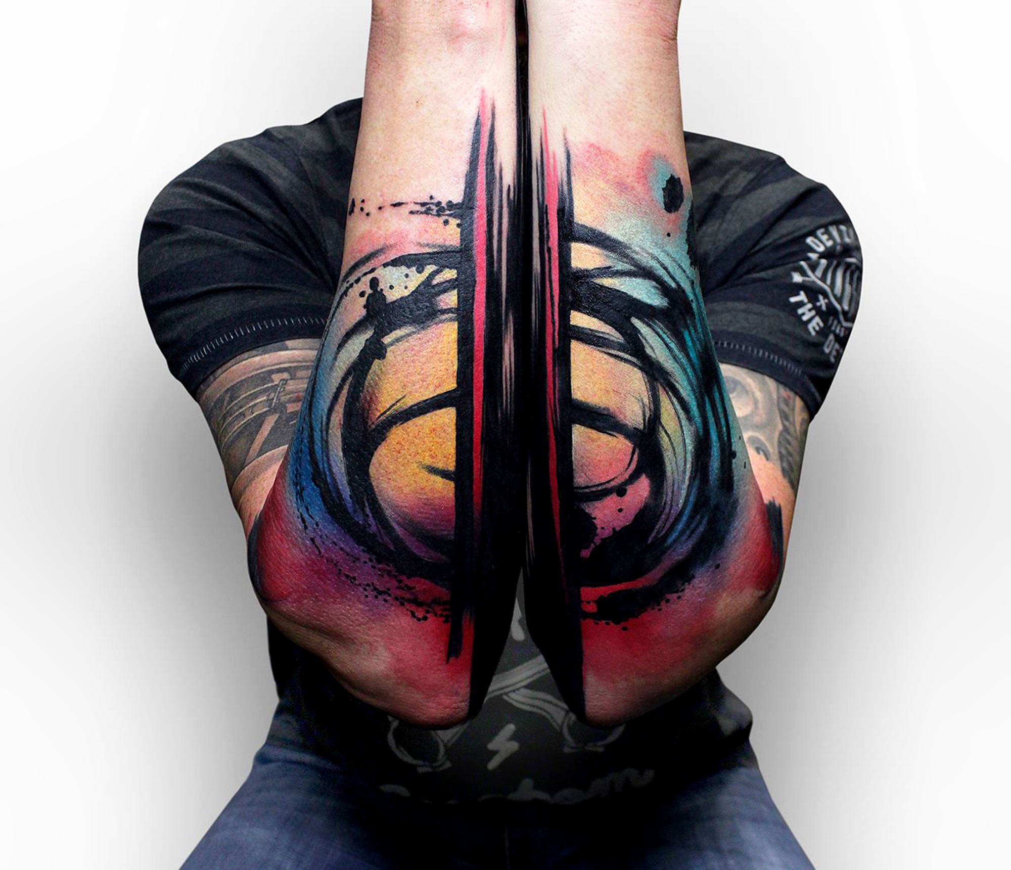 diptych tattoo on arms by szymon gdowicz