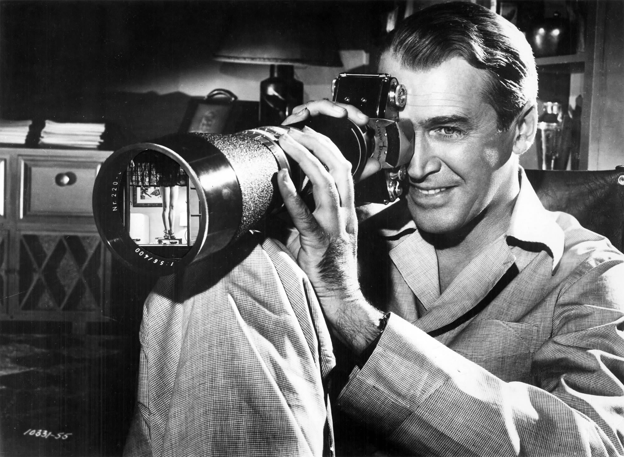 Rear Window, 1954. large lens camera, stalking