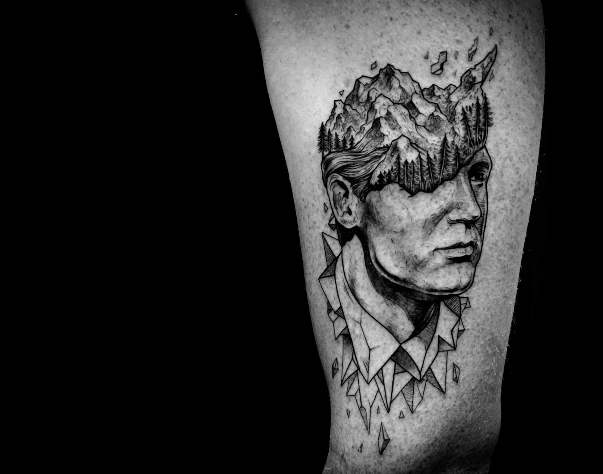 tattoo of head split open on leg by nick broslavski