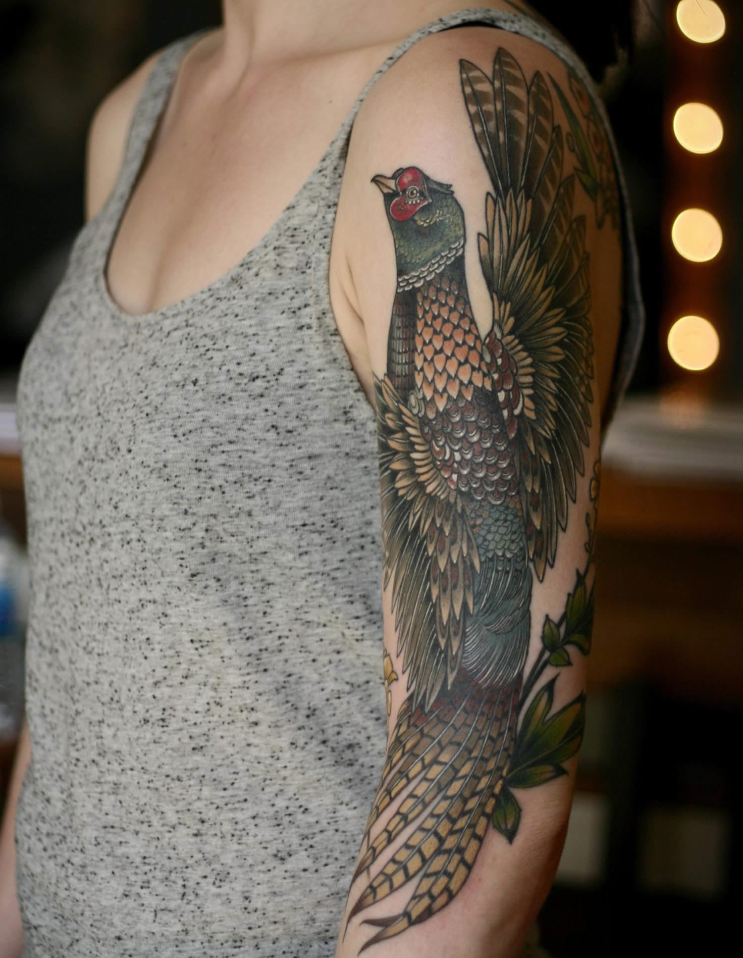 pheasant bird tattoo on arm