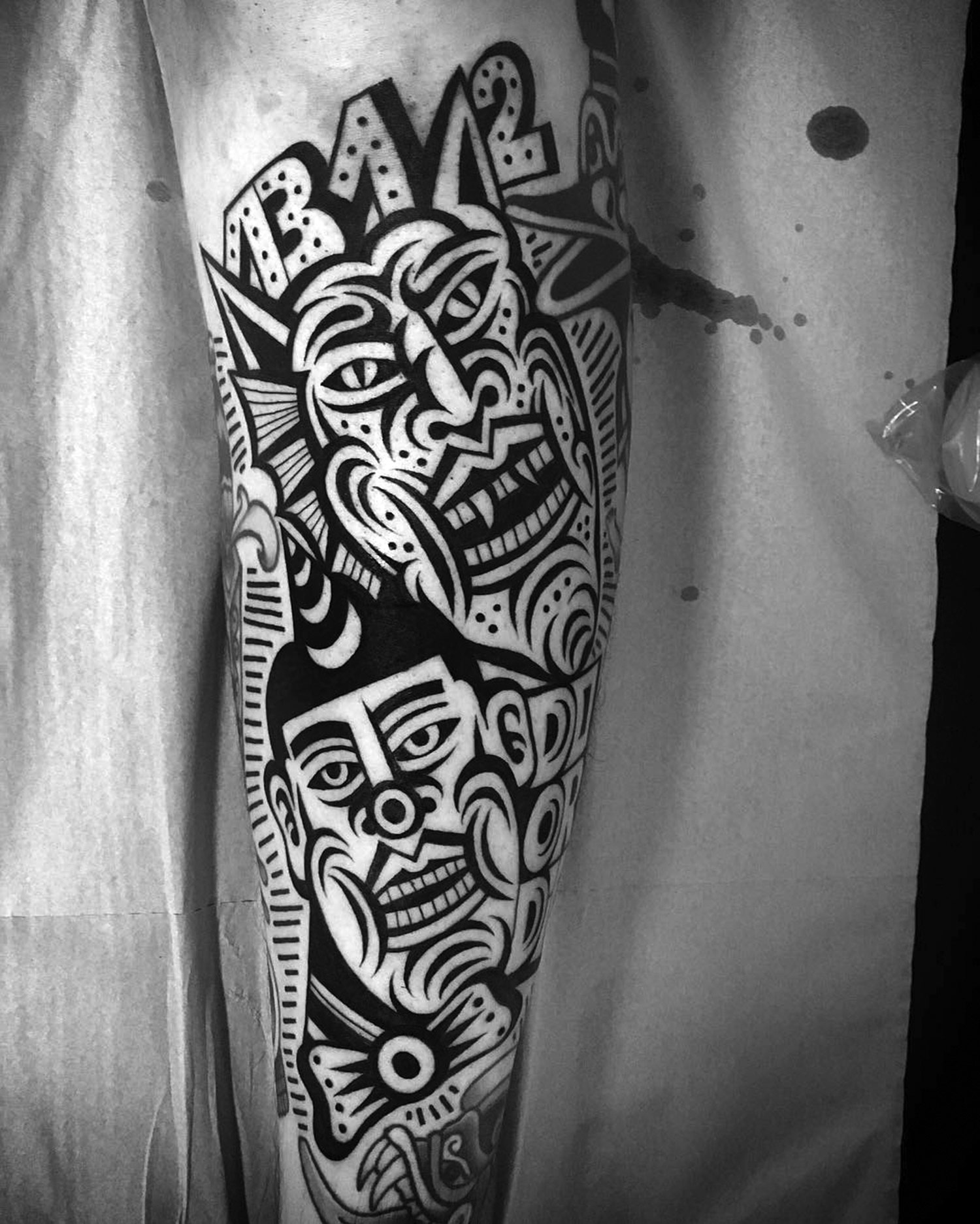 mask-like thigh tattoo by luxiano street cassic