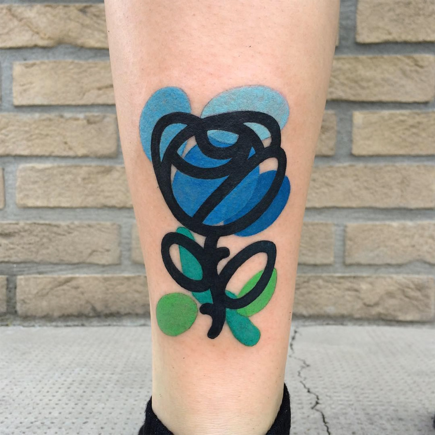 blue flower tattoo, marker style