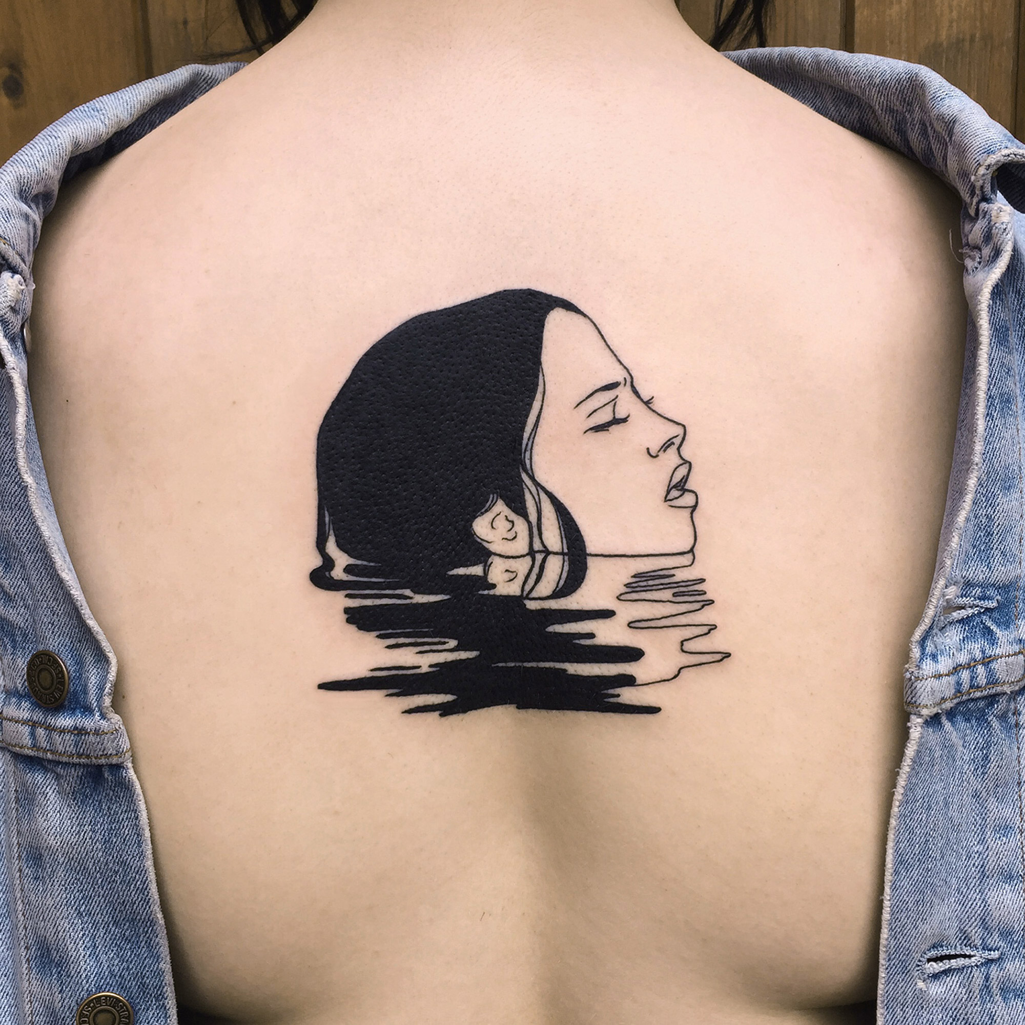 Silly Jane, Tattoo - reflection of woman's head in water