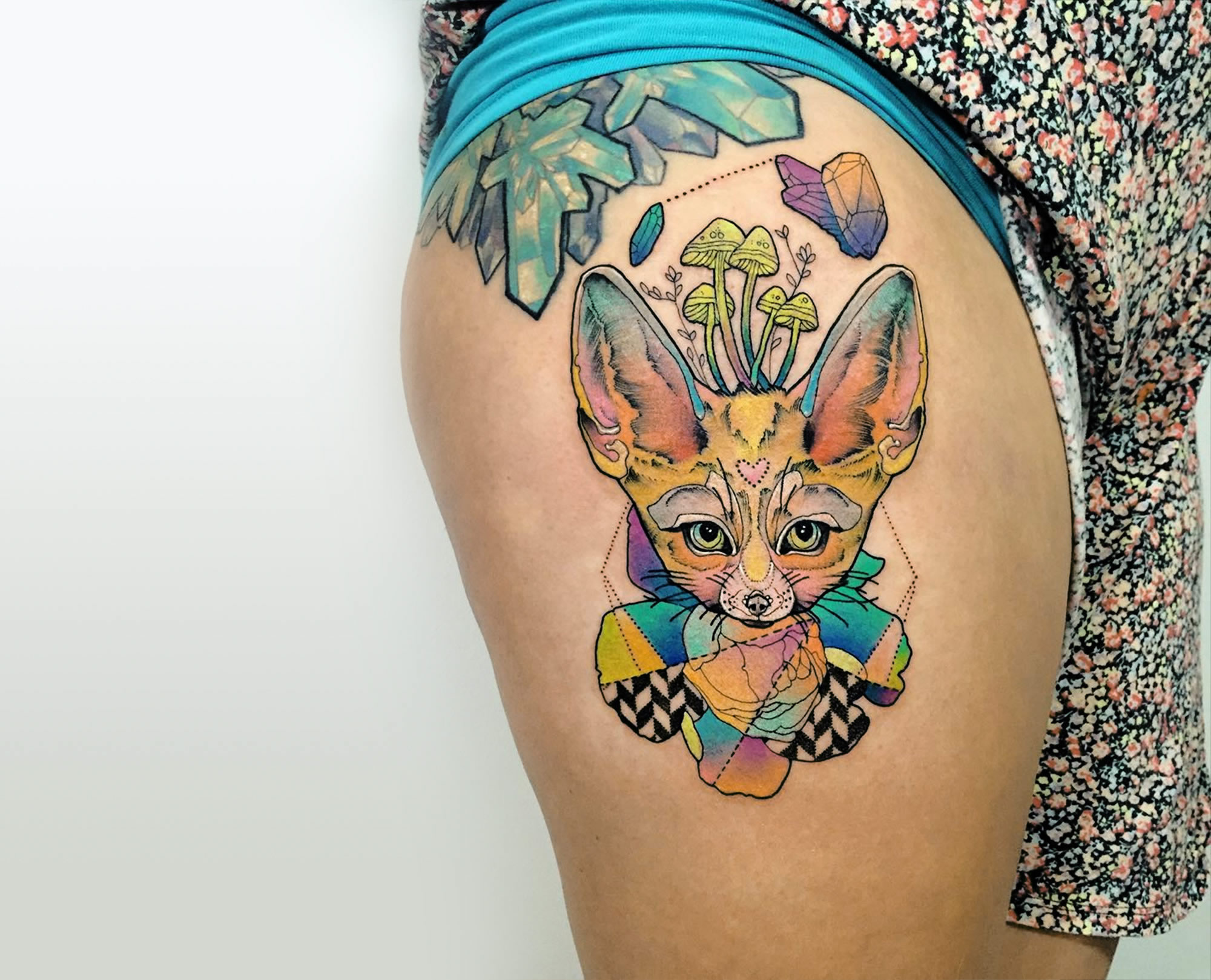 rainbow colored fox, tattoo on leg