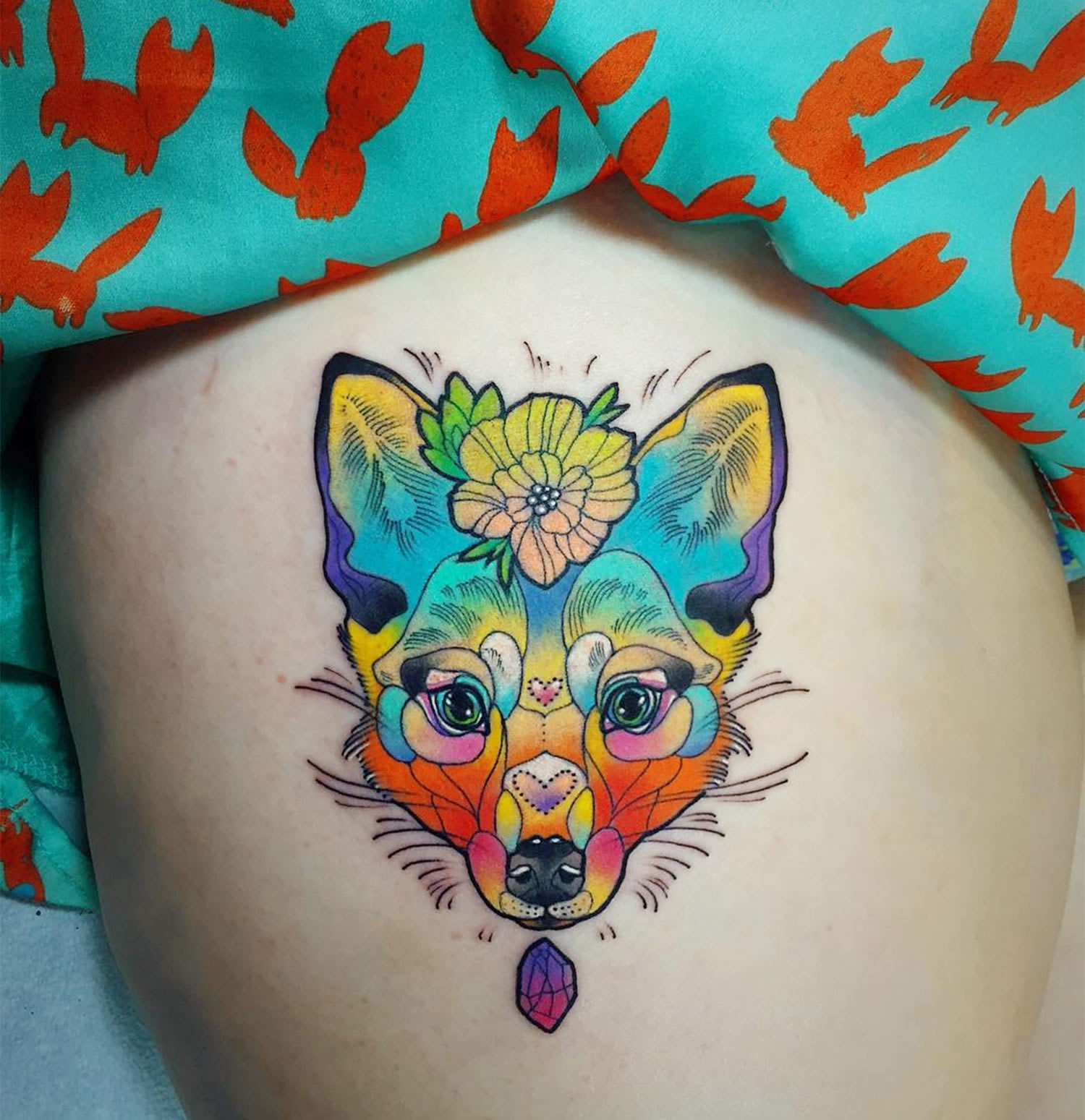 bright colored fox tattoo